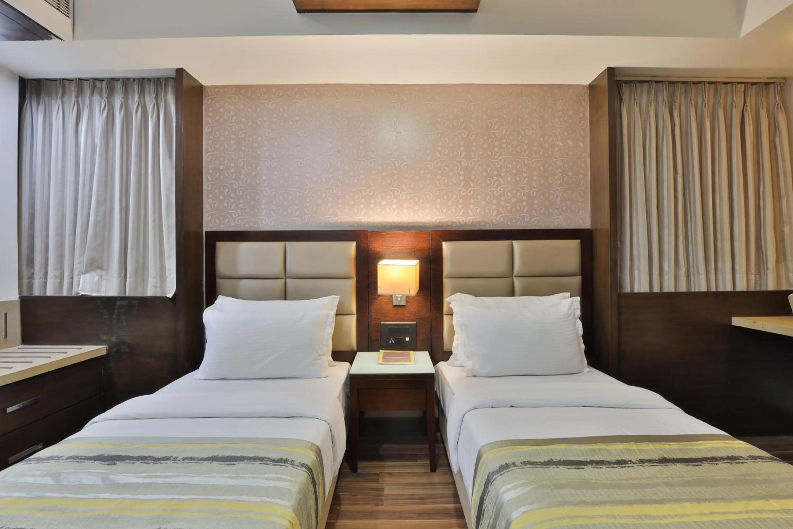 Bed in Krios Hotel - Near SG Highway, Ahmedabad