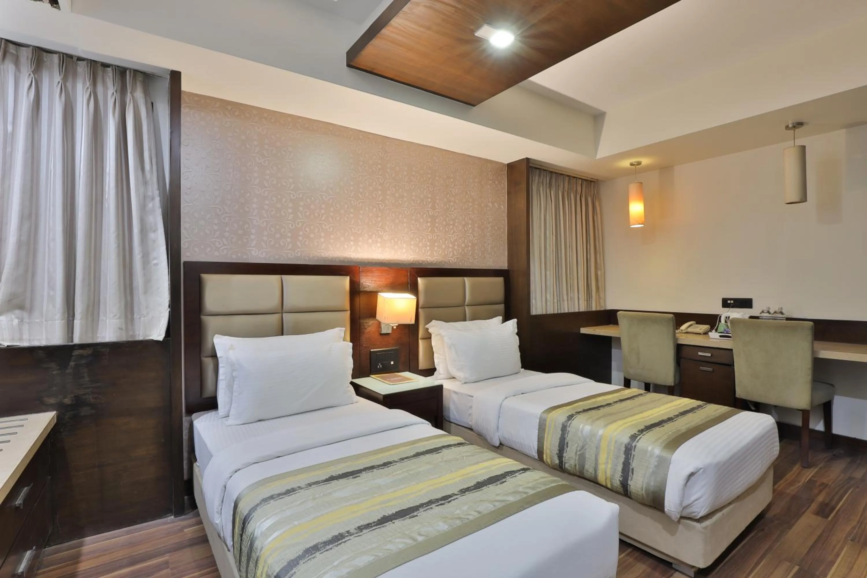 Bed in Krios Hotel - Near SG Highway, Ahmedabad