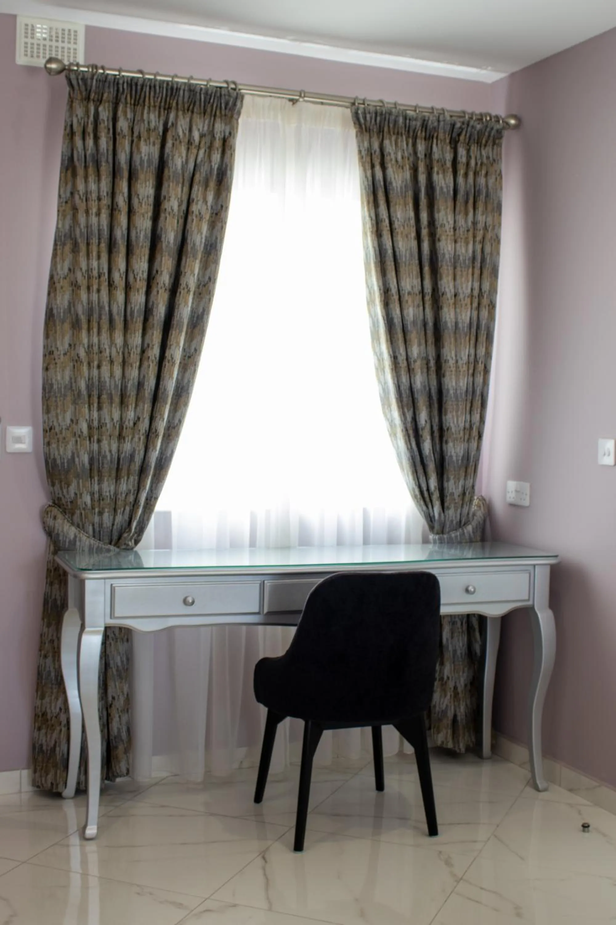 Seating area in 100 Boutique Living