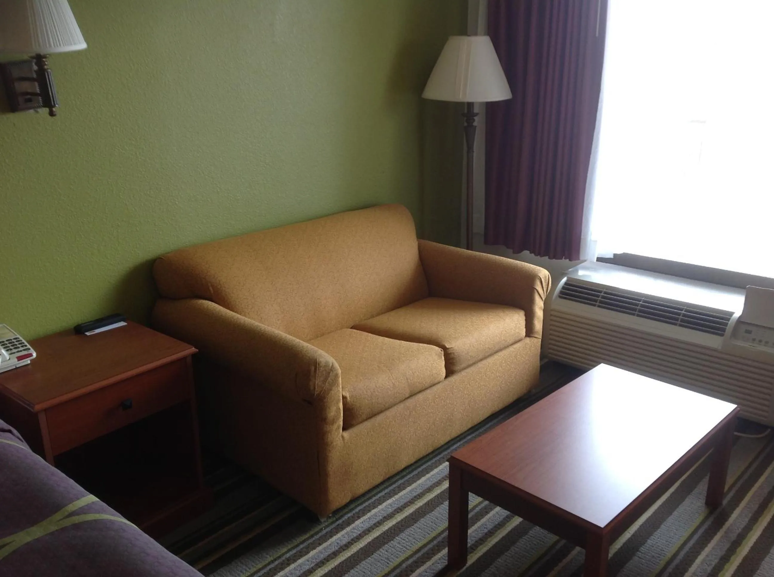 Seating area in Super 8 by Wyndham Longview/North