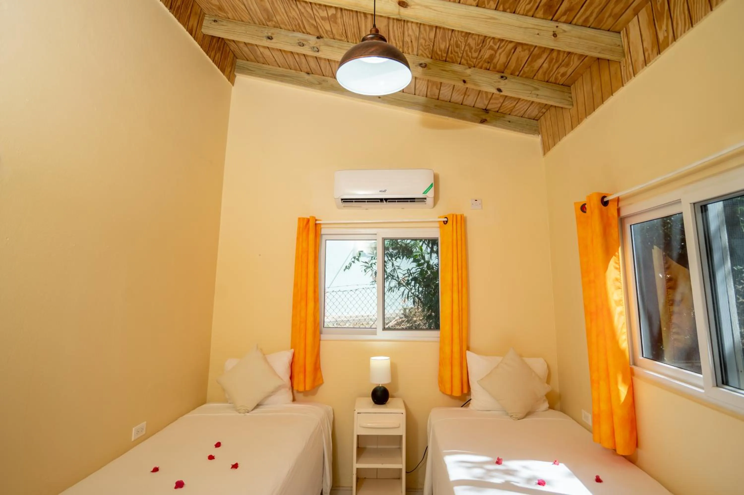 Bed in Beyond Sunset Resort & Villas