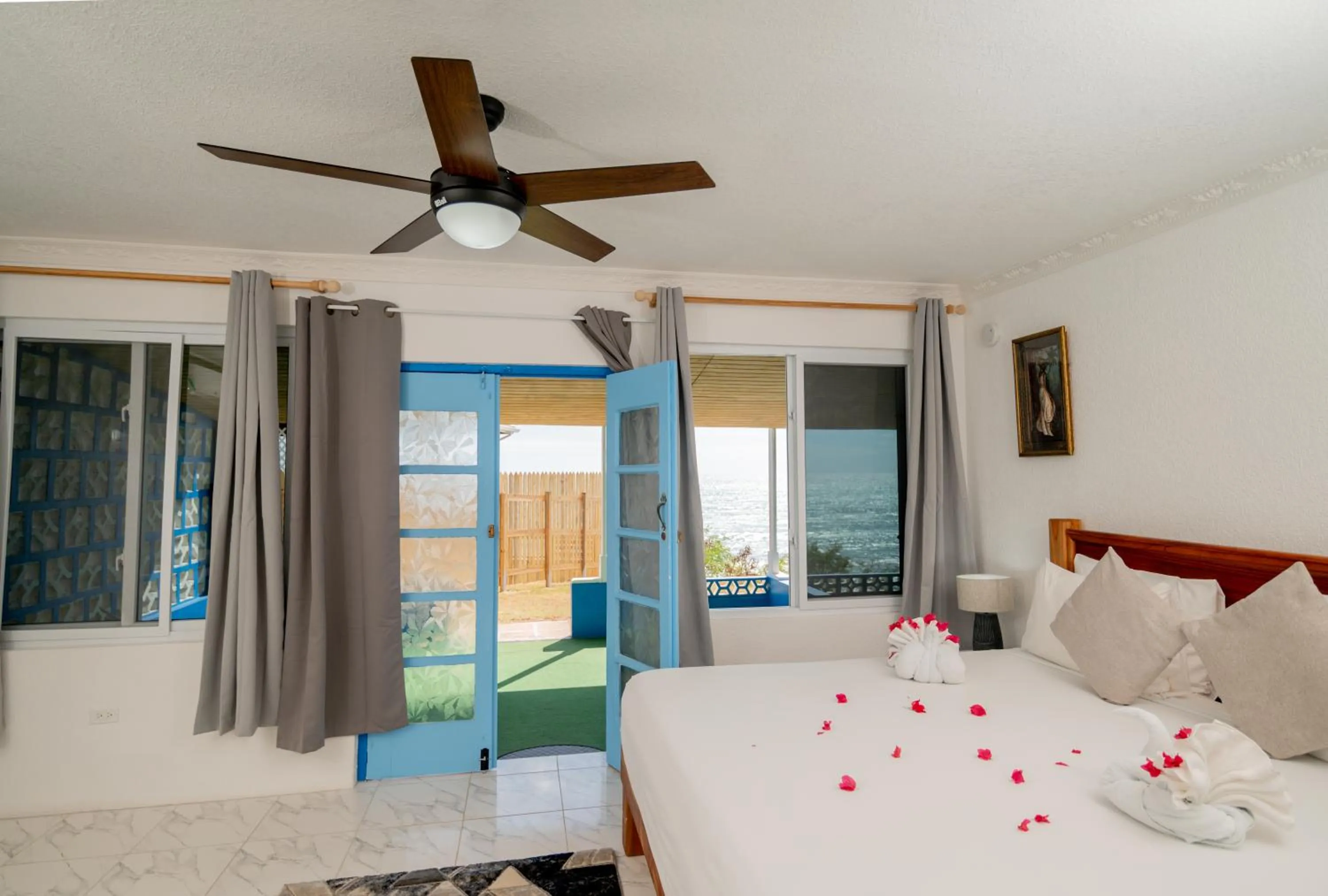 Bed in Beyond Sunset Resort & Villas