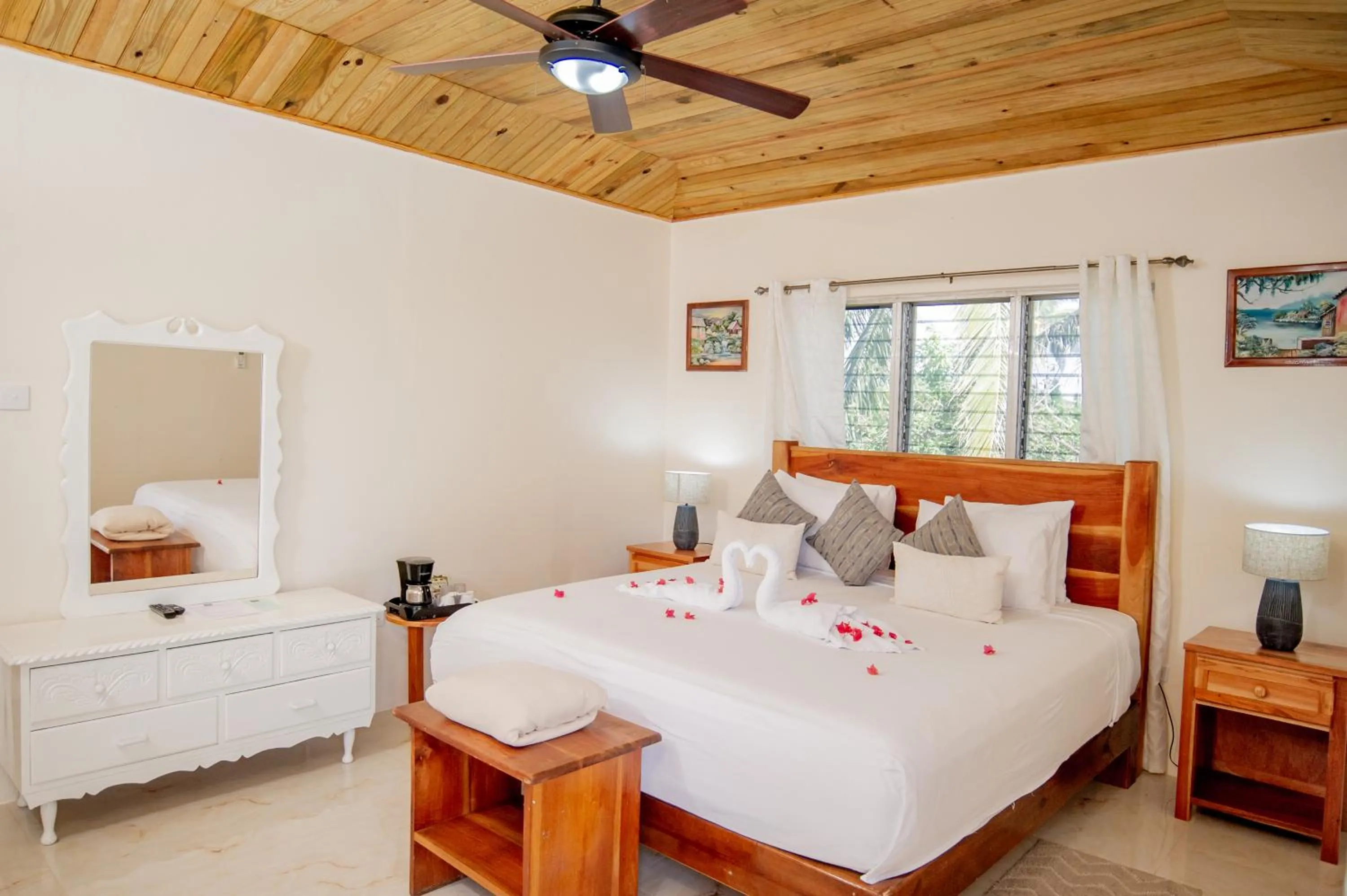 Bed in Beyond Sunset Resort & Villas