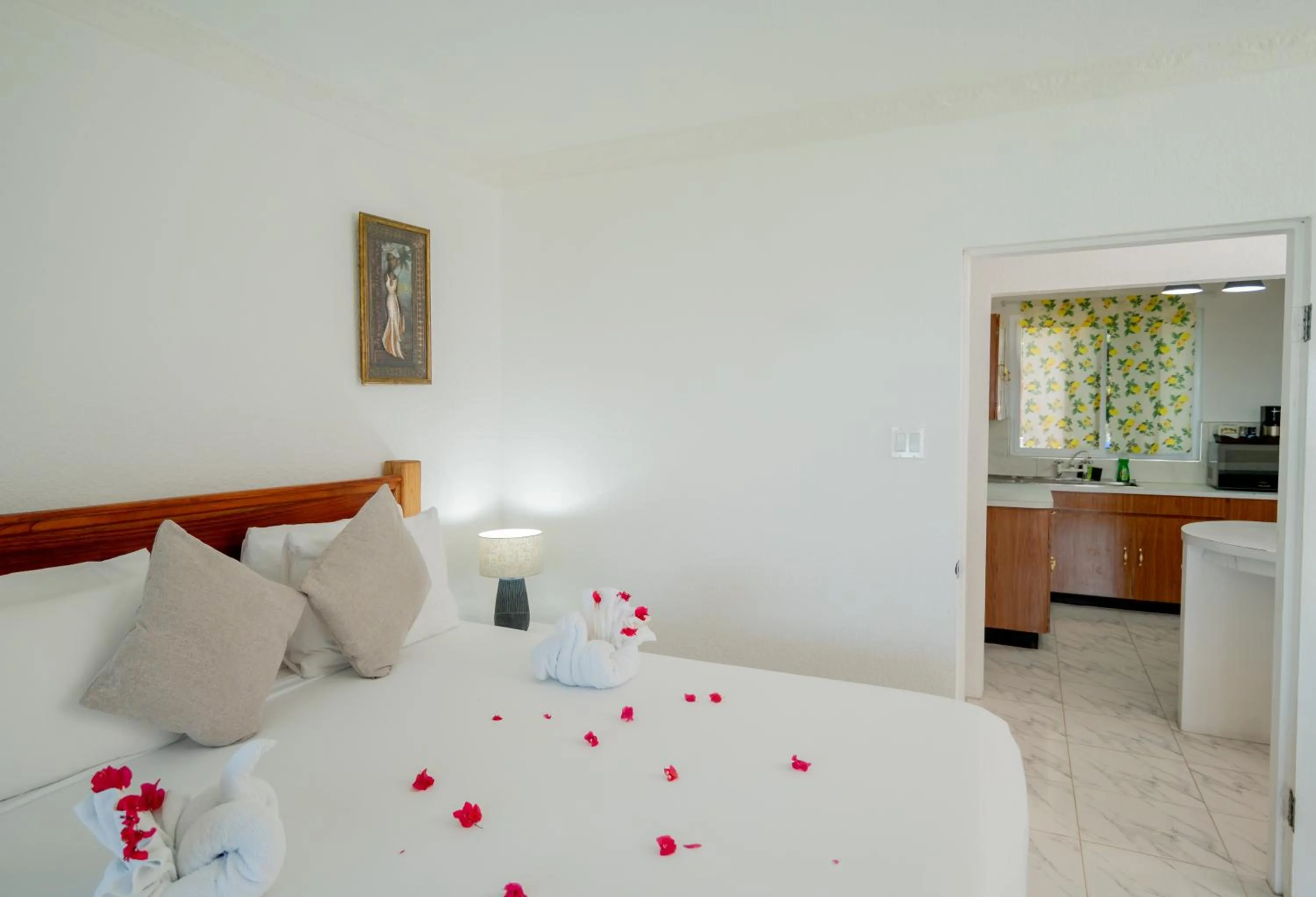 Bed in Beyond Sunset Resort & Villas