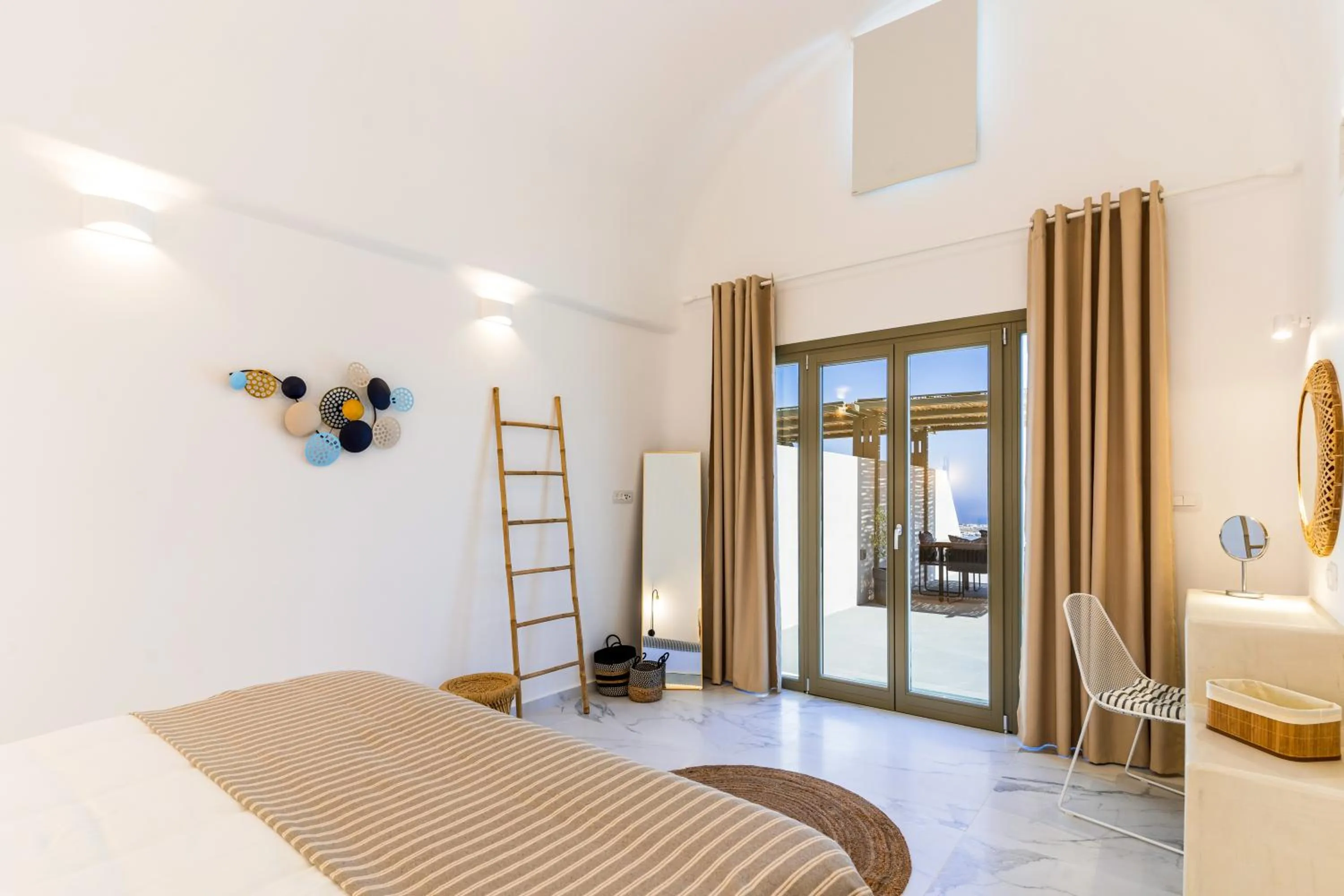 Bed in Lavadoze Luxury Suites