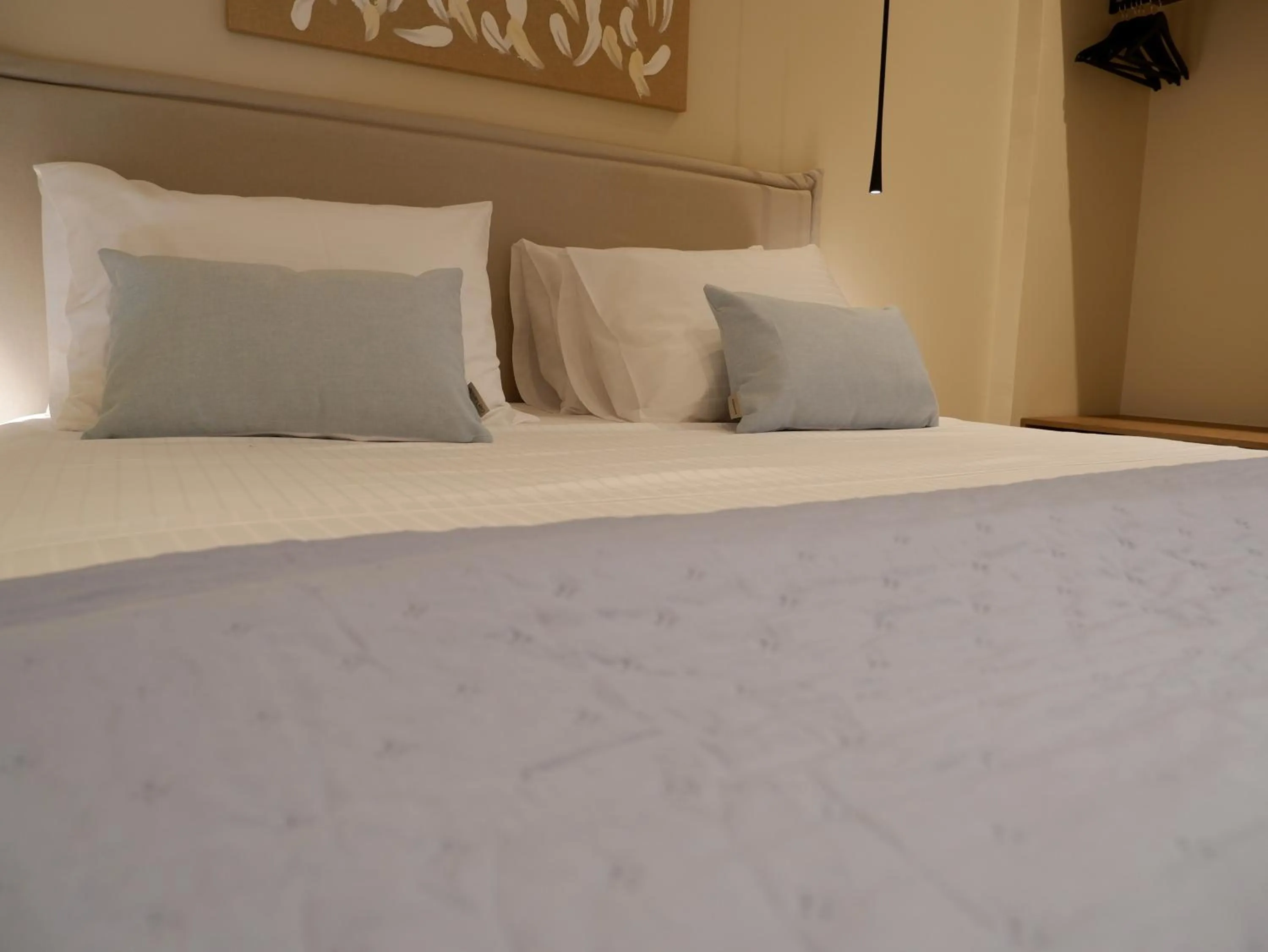 Bed in Kaiser Luxury Suites