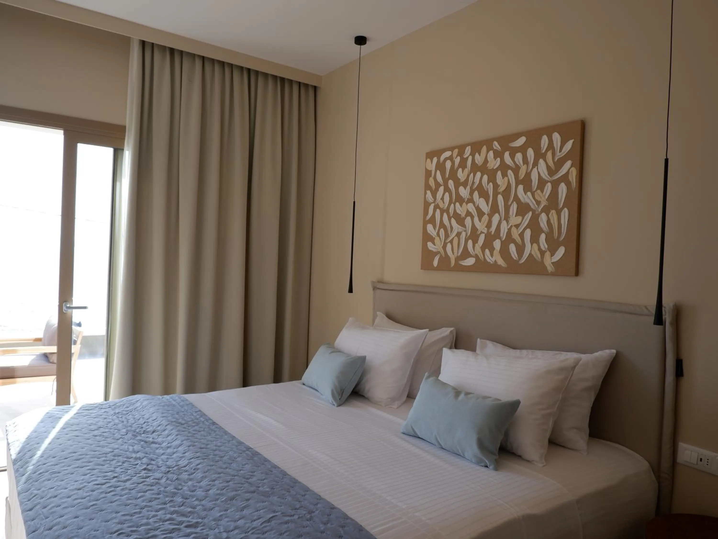 Bed in Kaiser Luxury Suites