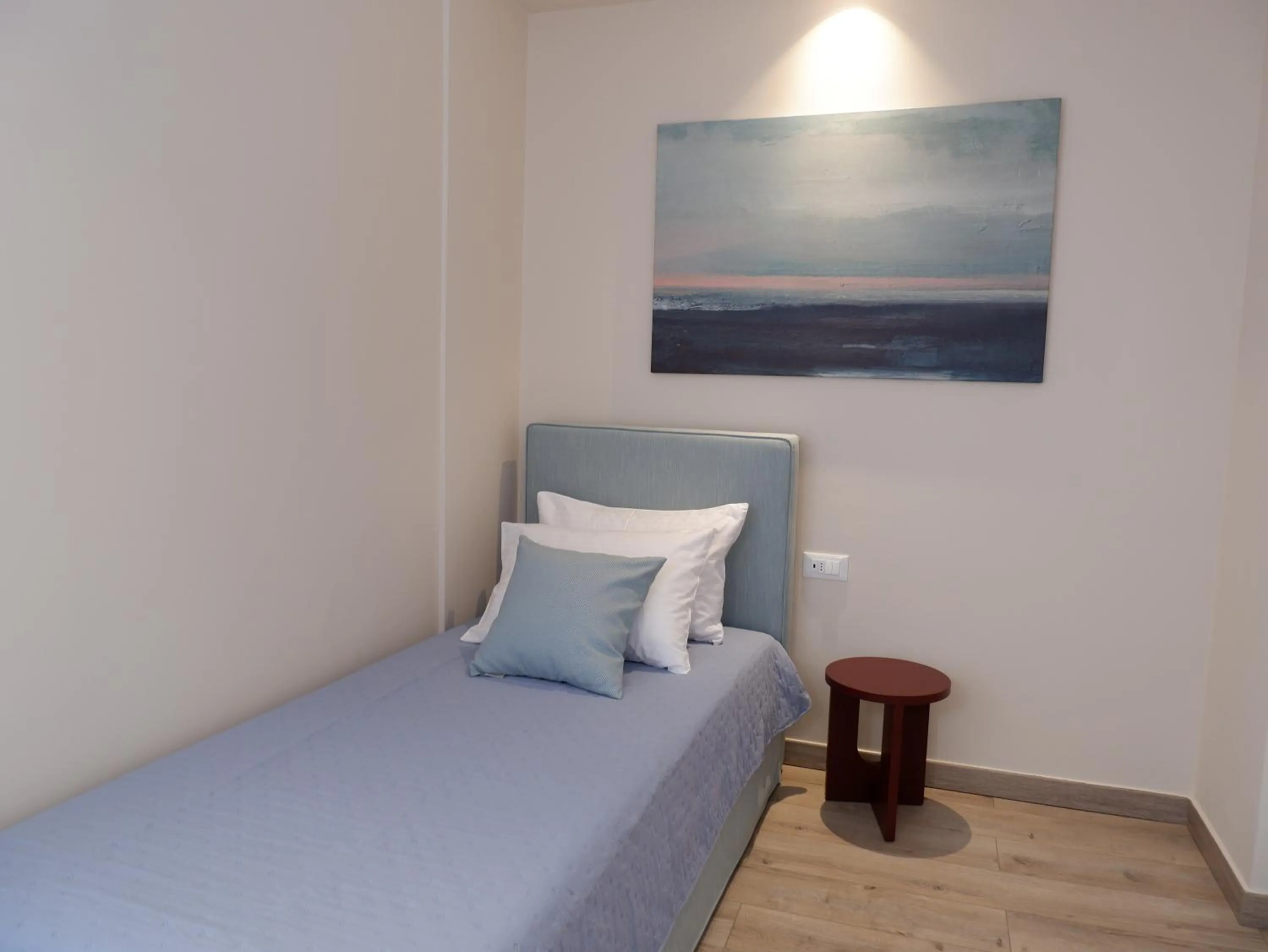 Bed in Kaiser Luxury Suites