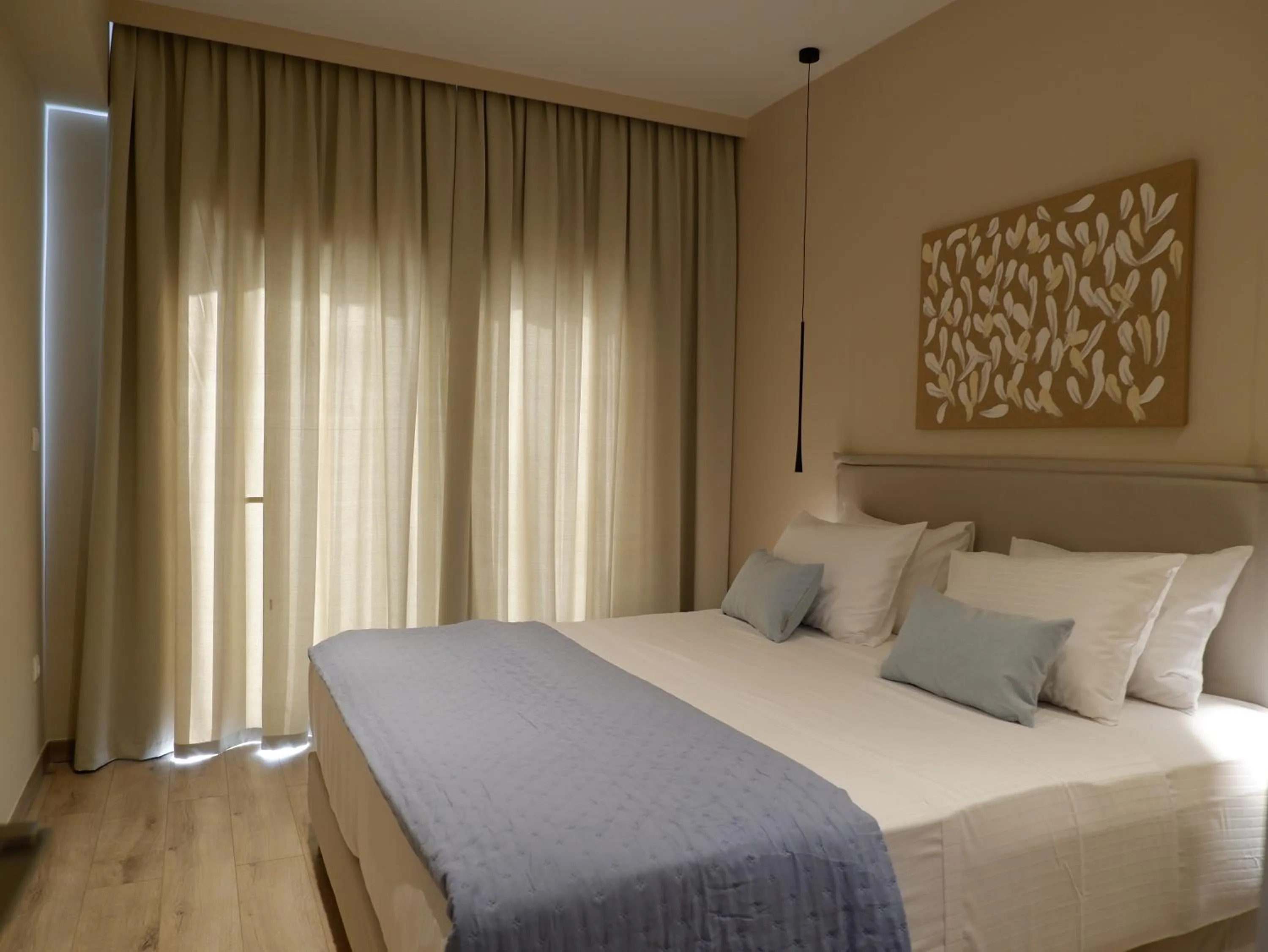 Bed in Kaiser Luxury Suites