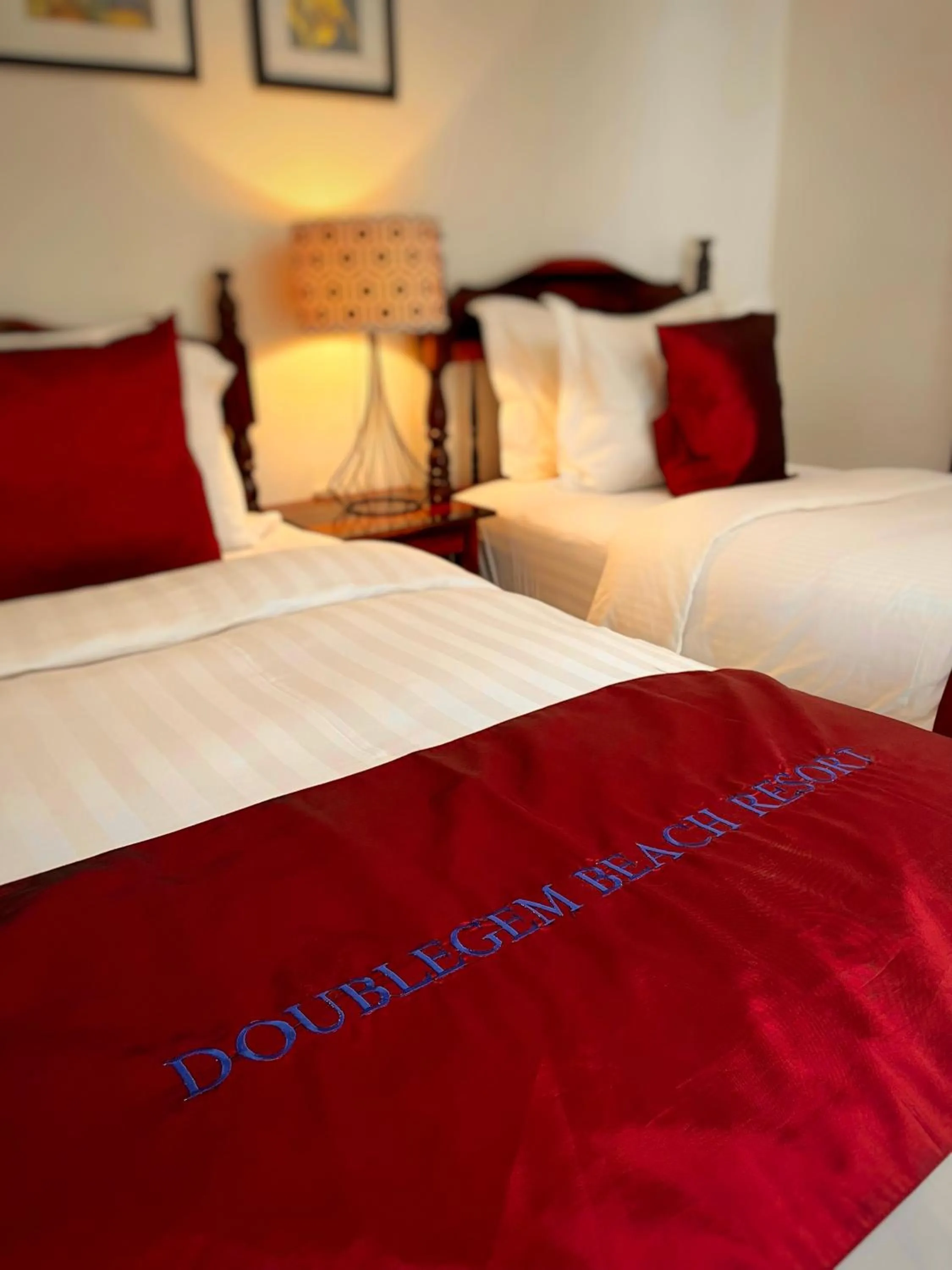Bed in Doublegem Beach Resort and Hotel