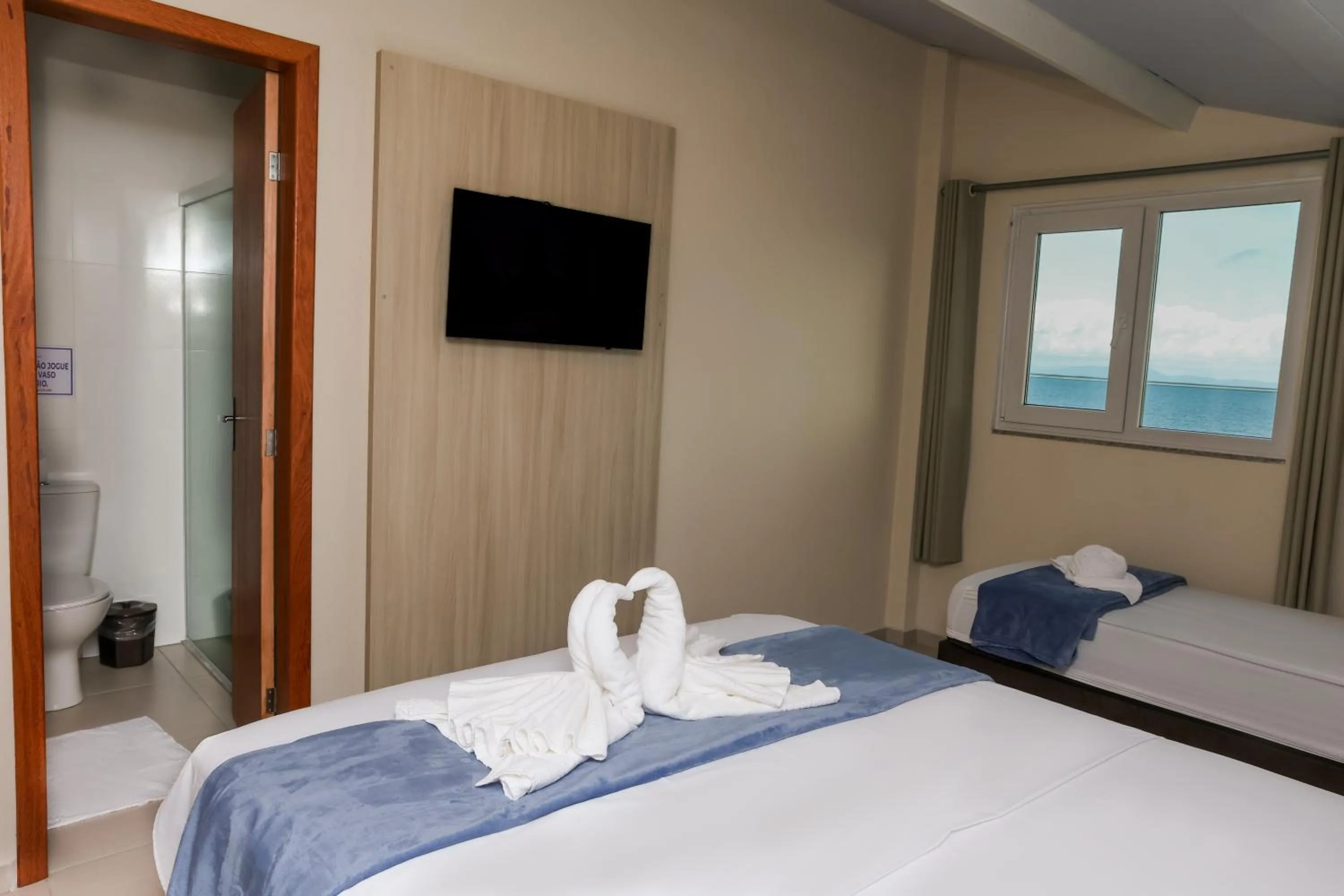 Bed in Pousada Roberto Monteiro - Frente Mar