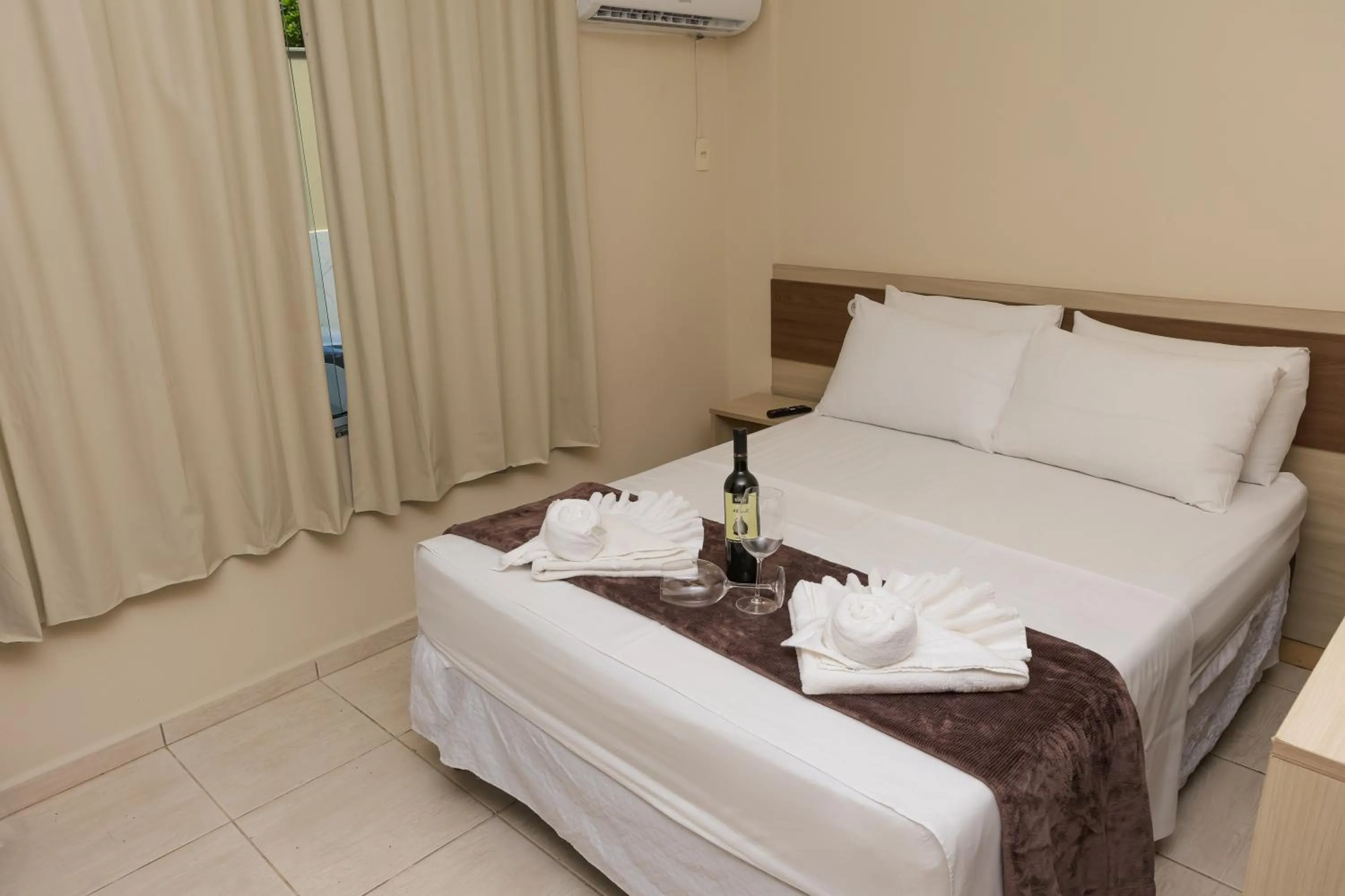 Bed in Pousada Roberto Monteiro - Frente Mar