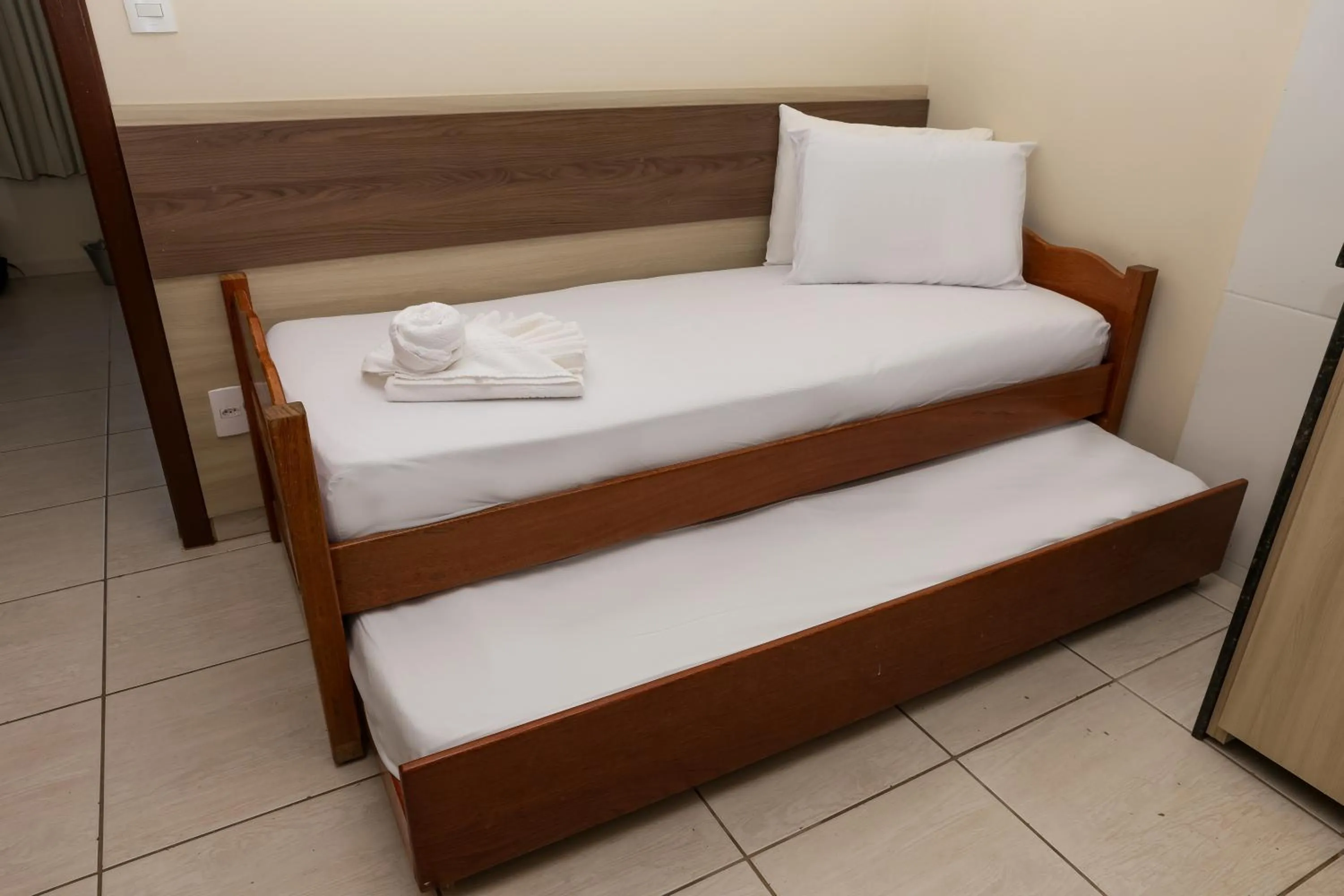 Bed in Pousada Roberto Monteiro - Frente Mar