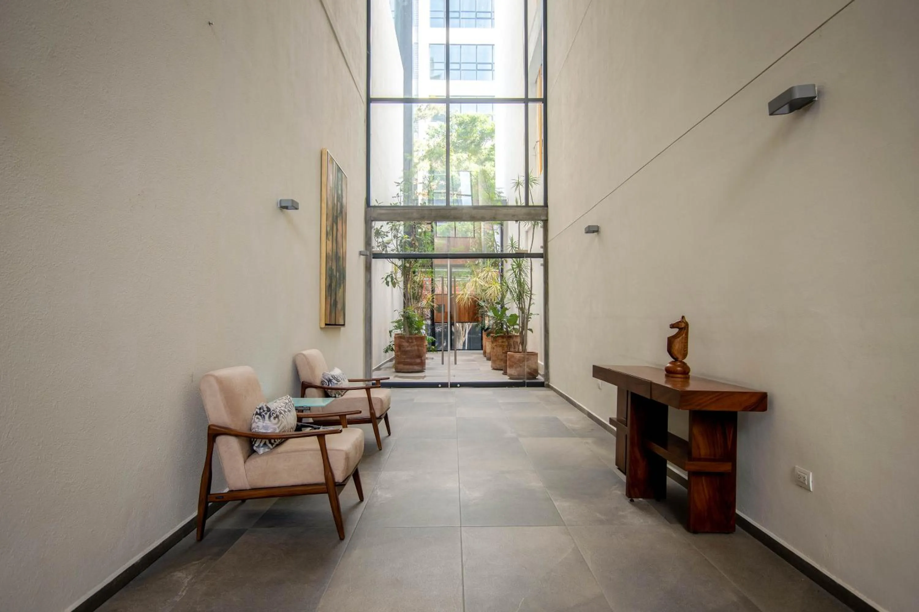 Lobby or reception in Tribu Sonata with pool