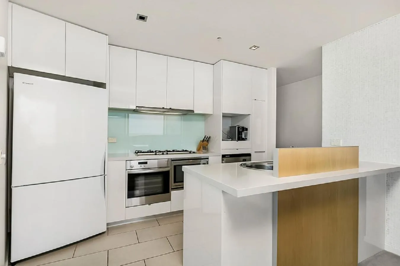 Kitchen or kitchenette in Melbourne Holiday Apartments Flinders Wharf