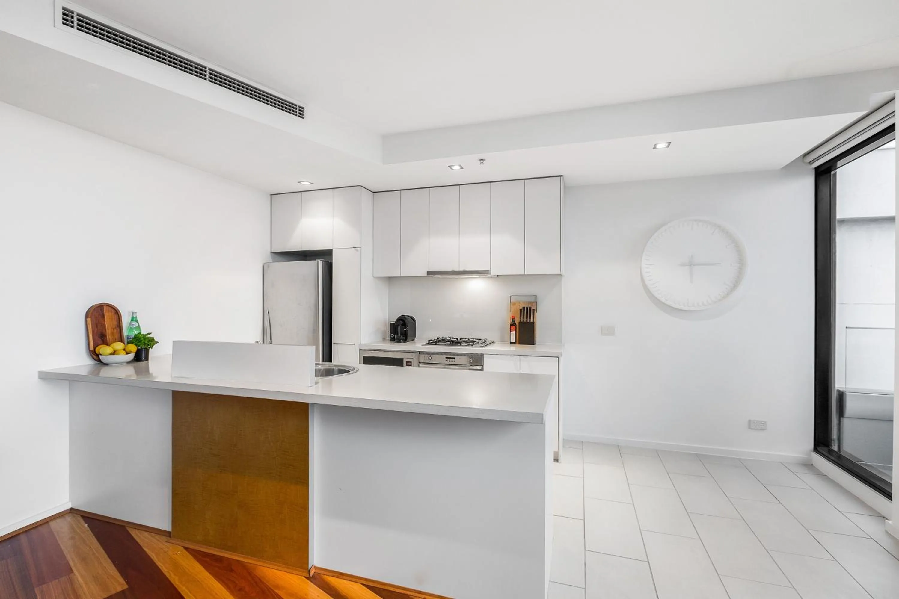 Kitchen or kitchenette in Melbourne Holiday Apartments Flinders Wharf