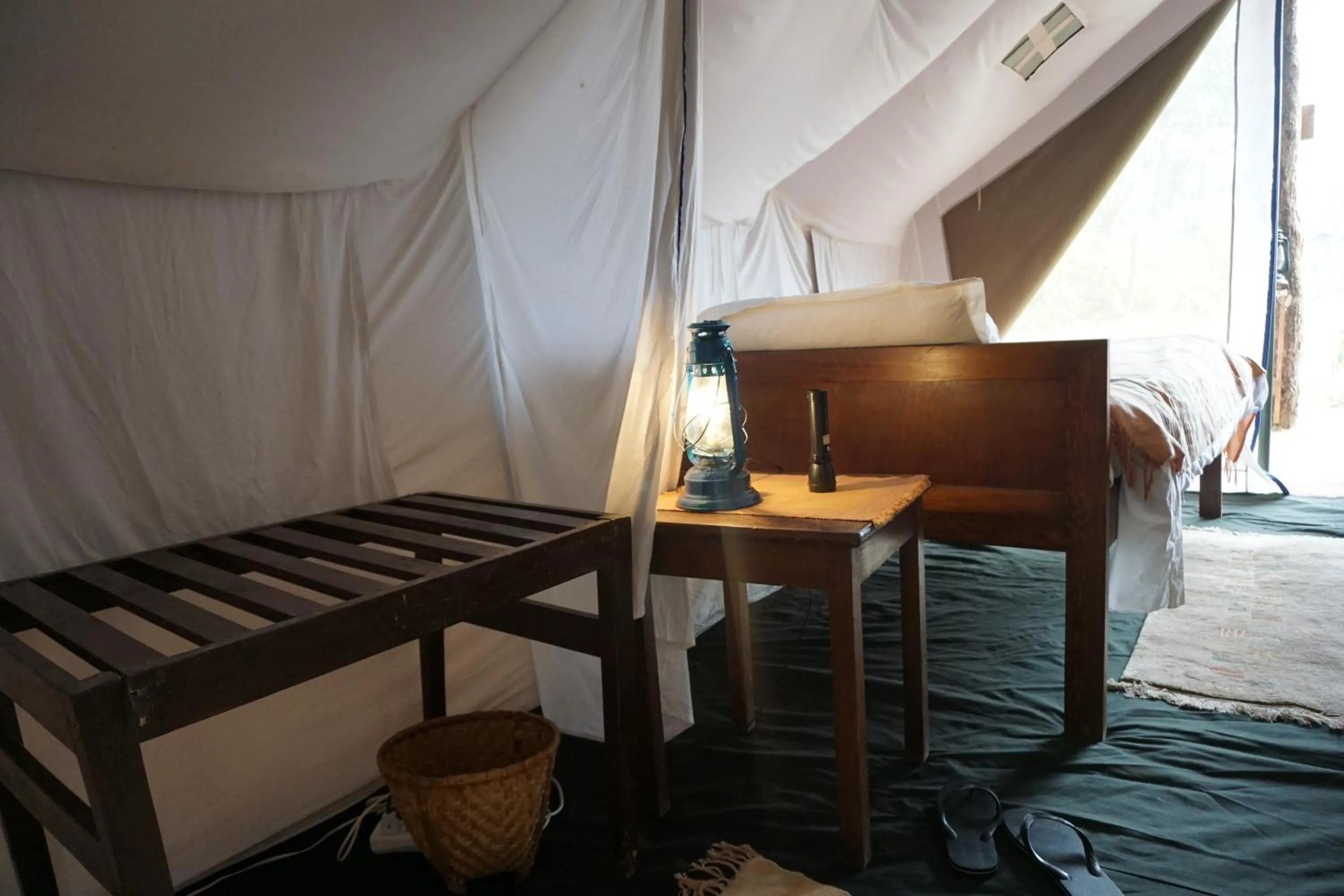 Bed in Tiger Tops Tharu Lodge