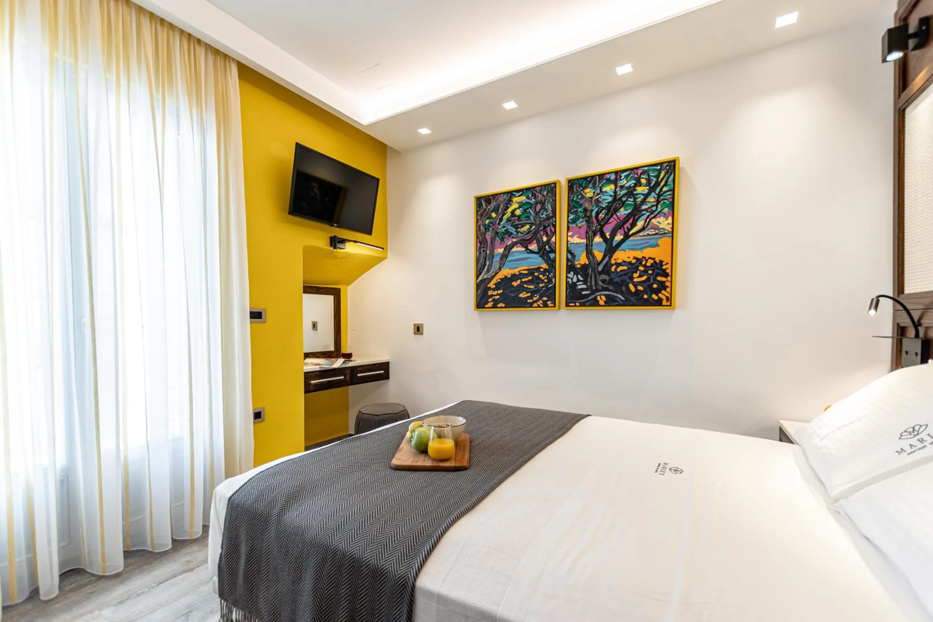 Bed in Mariet Naxos Elegant Suites