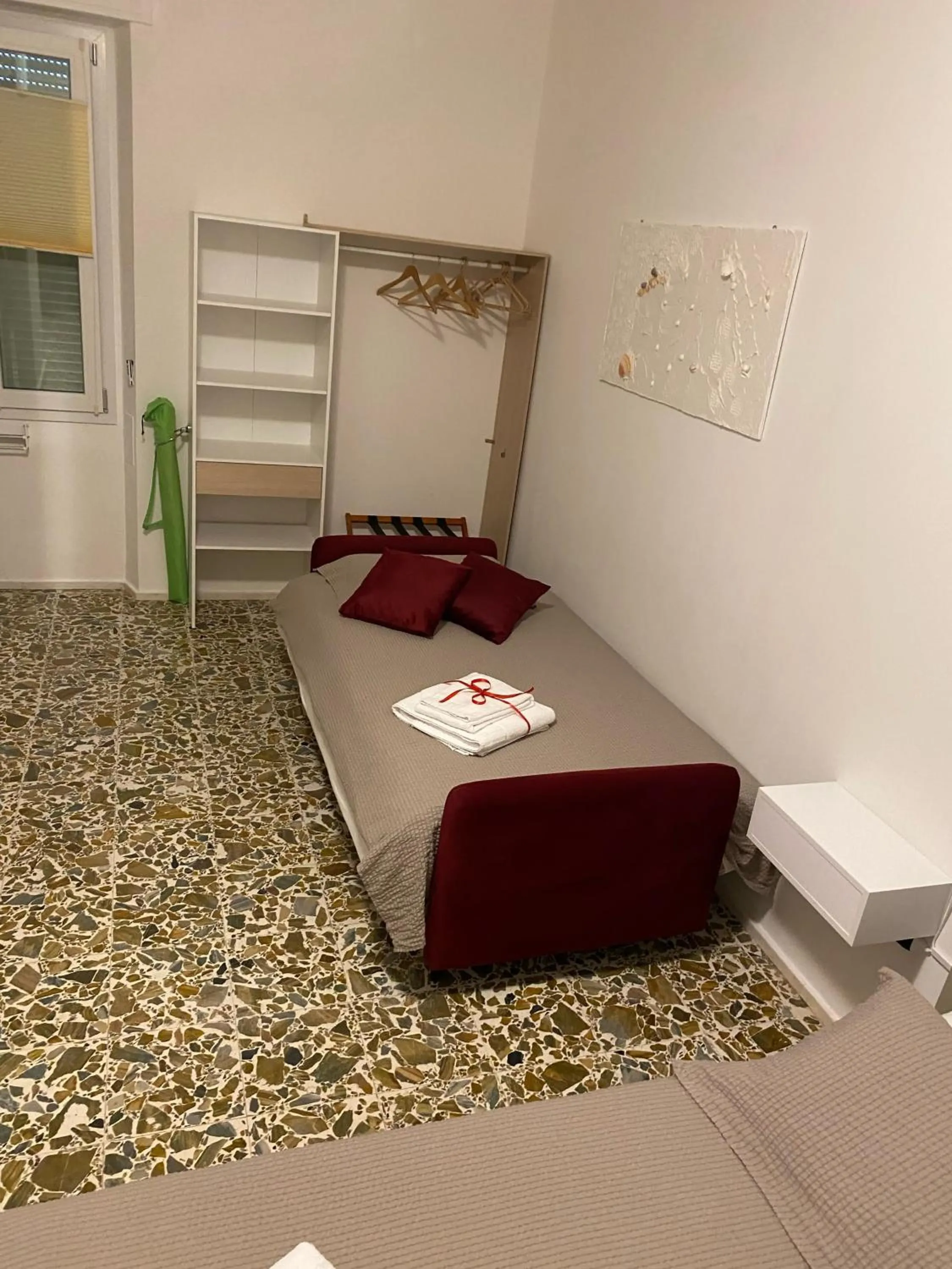 Bedroom in Rossocorallo Rooms