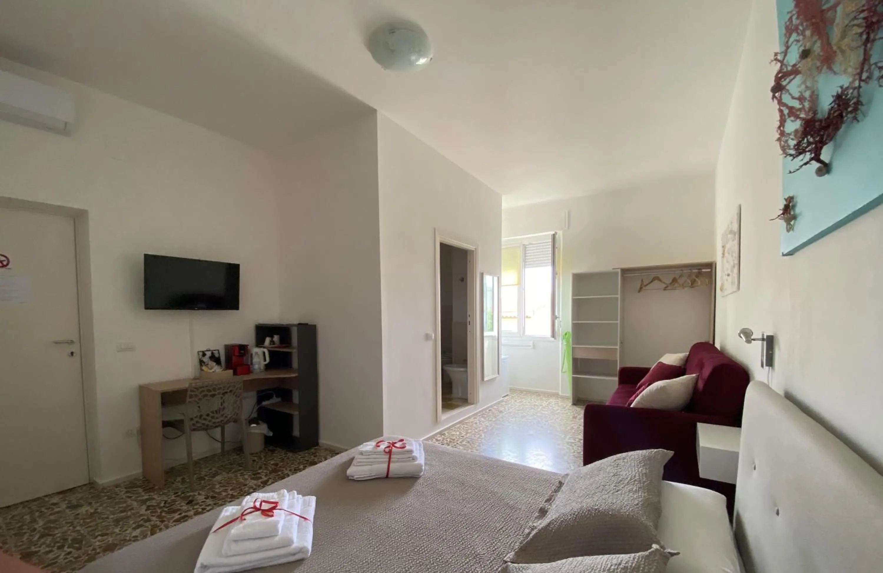 Bedroom in Rossocorallo Rooms