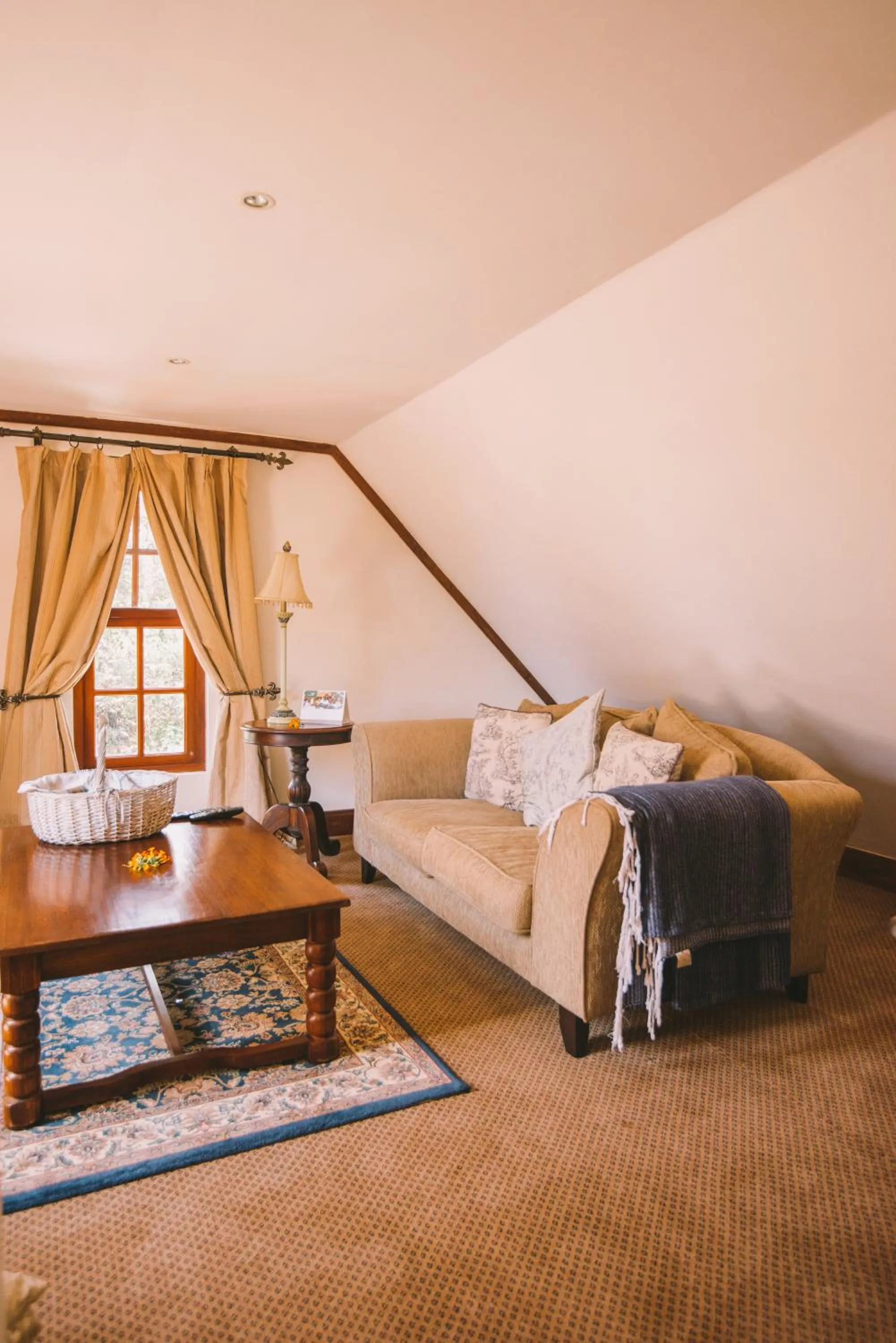 Seating area, Bed in The Manor at Ngorongoro