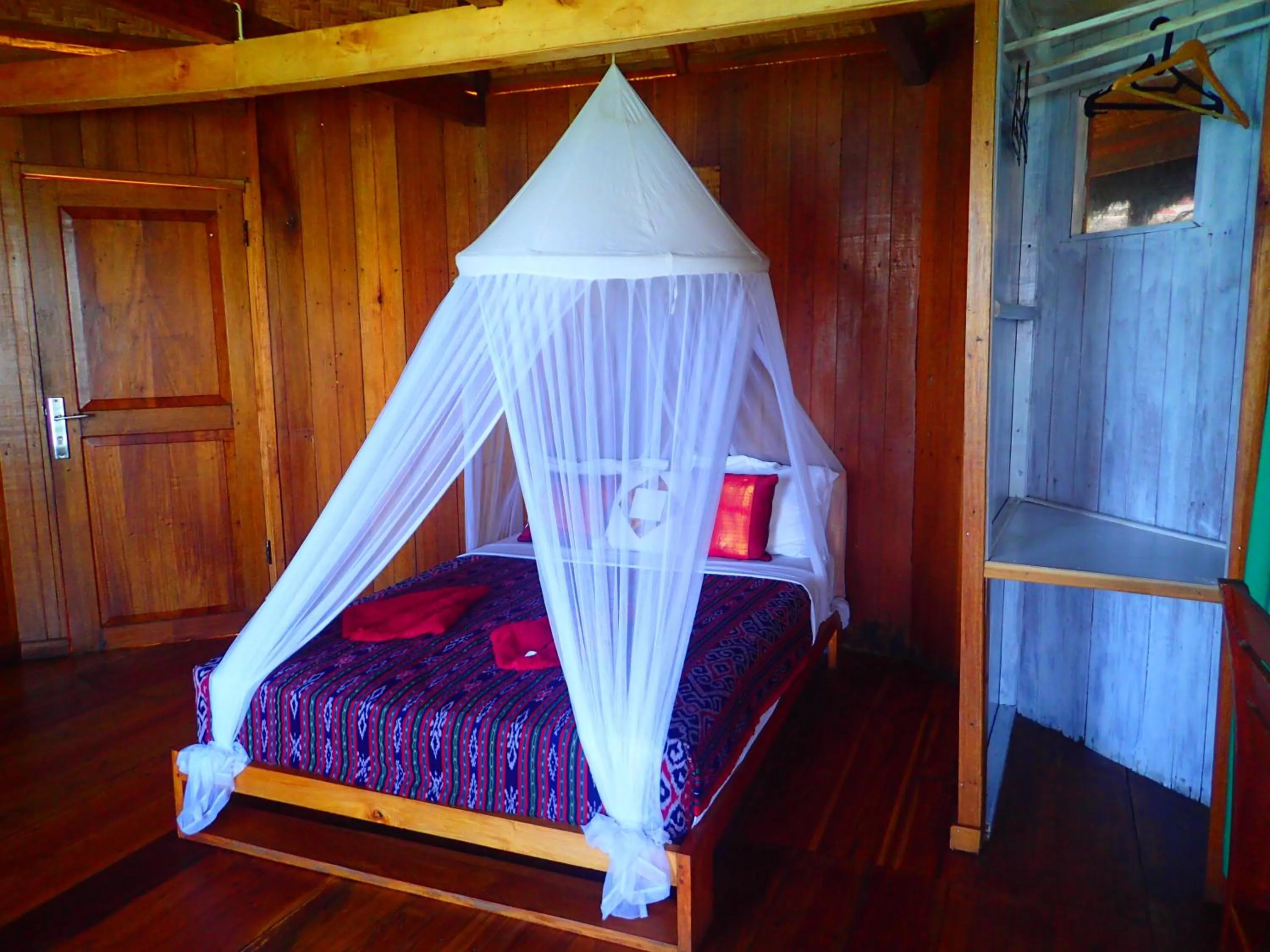 Photo of the whole room, Bed in Waecicu Eden Beach Hotel