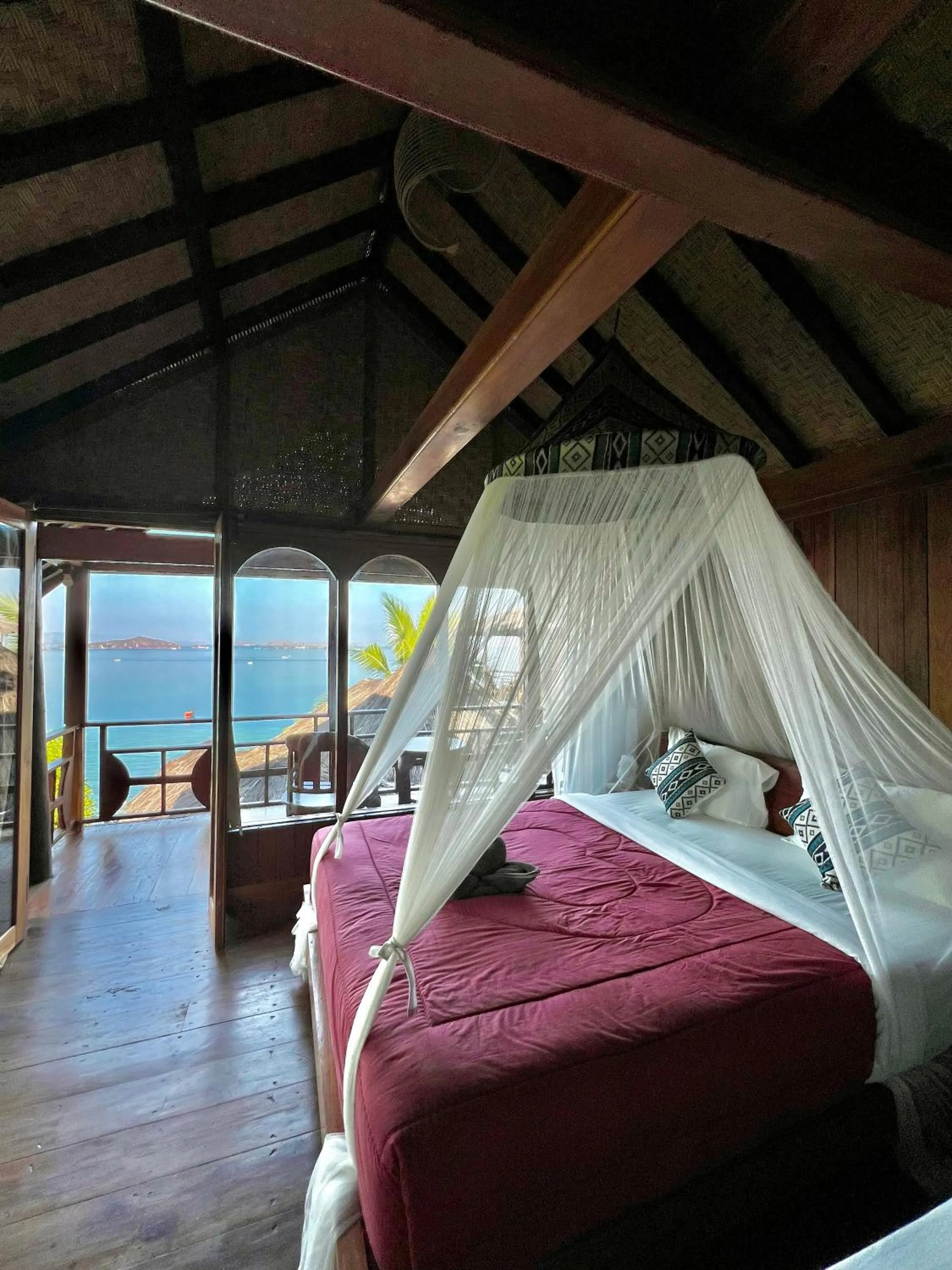 Bed in Waecicu Eden Beach Hotel