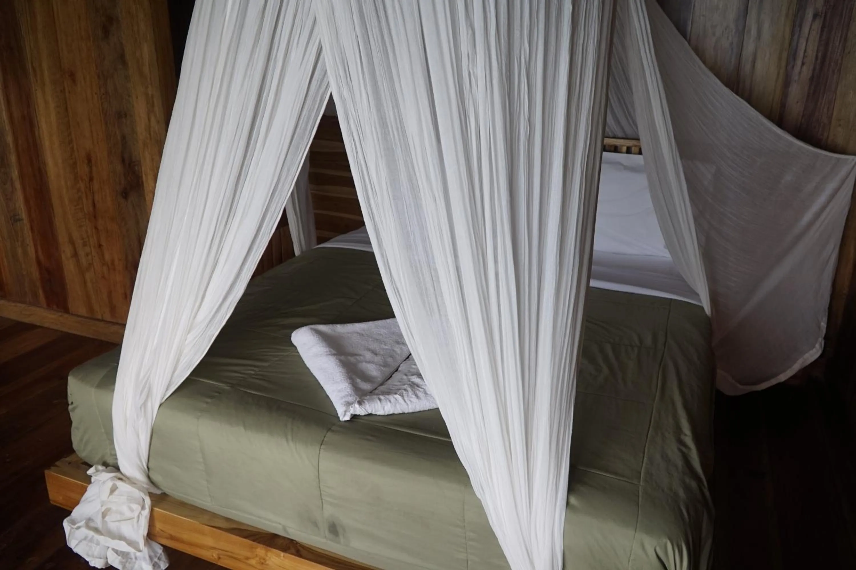 Bed in Waecicu Eden Beach Hotel