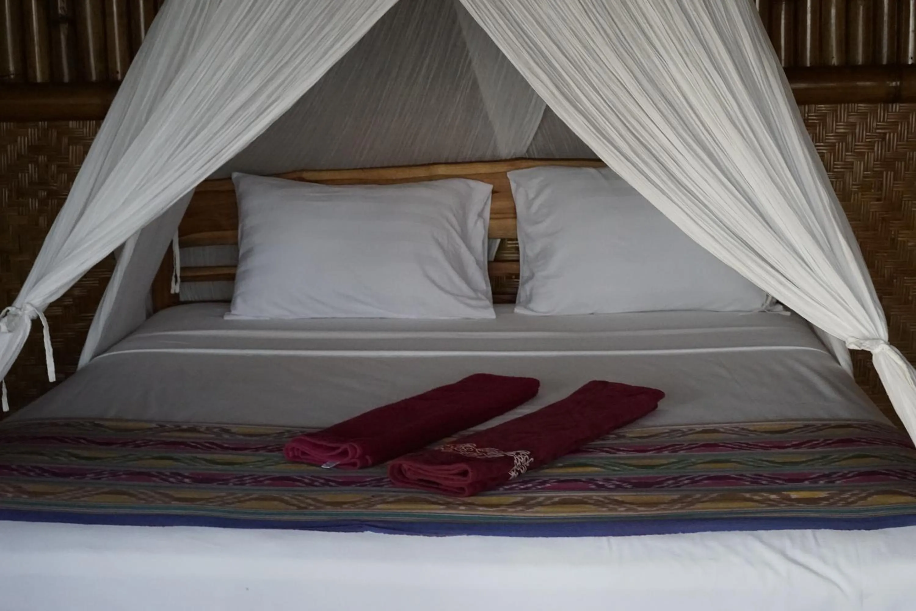 Bed in Waecicu Eden Beach Hotel