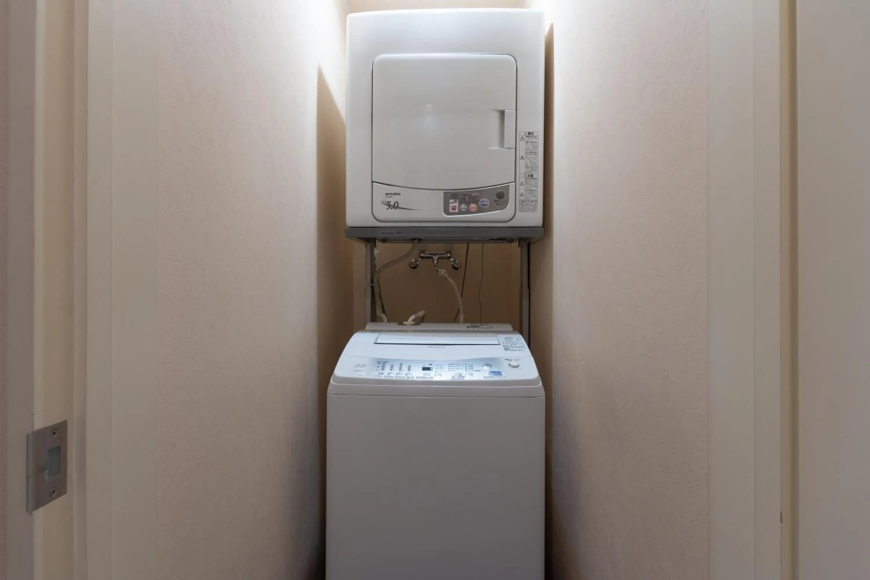 washing machine in Gondola Chalet by H2 Life