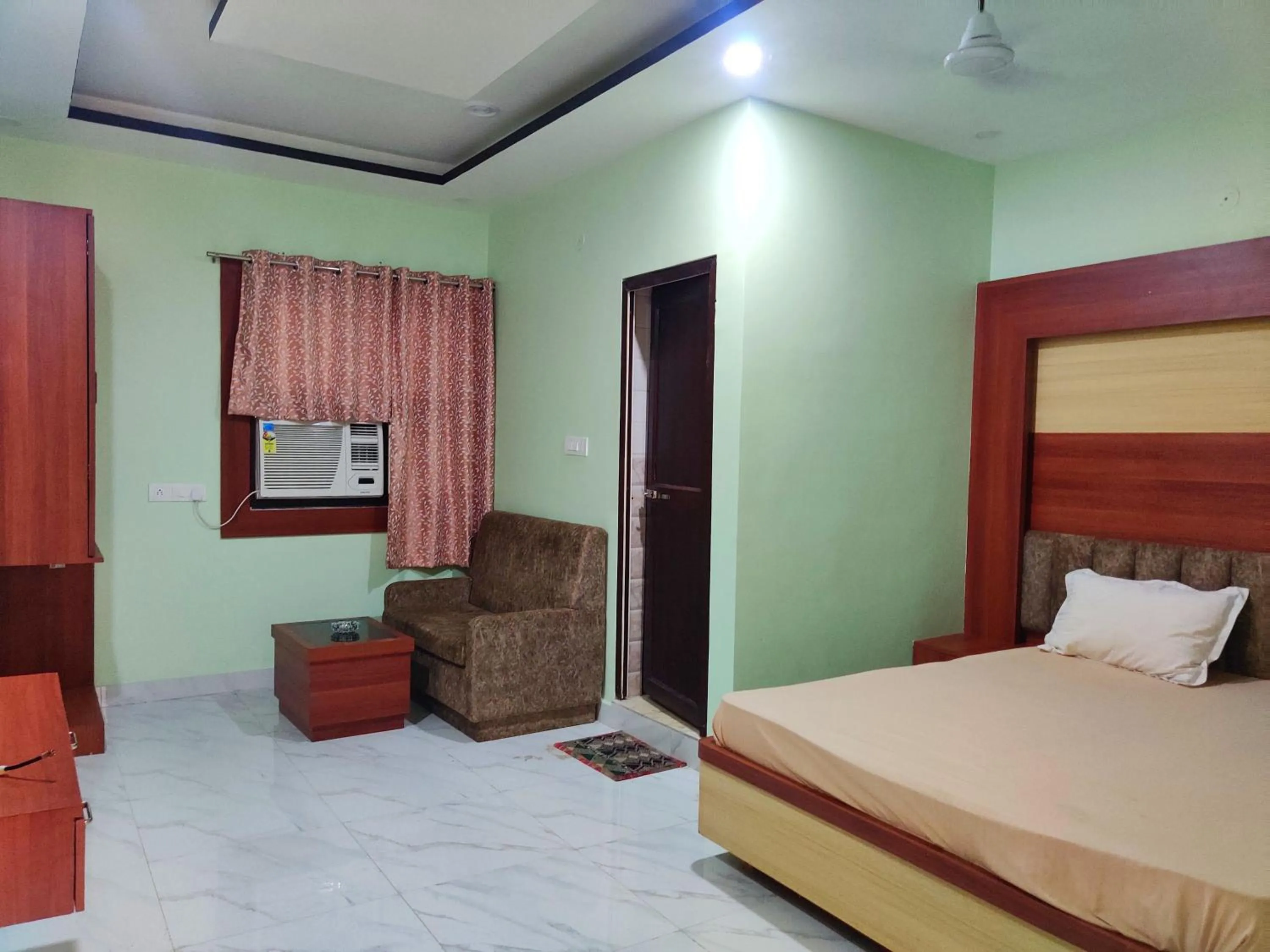 Bedroom in Hotel O Anandam Residency