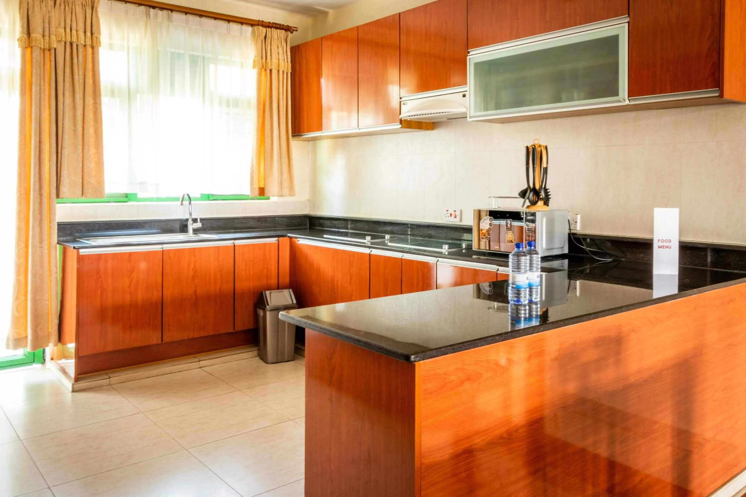 Kitchen or kitchenette in Highlands Suites Hotel and Apartments