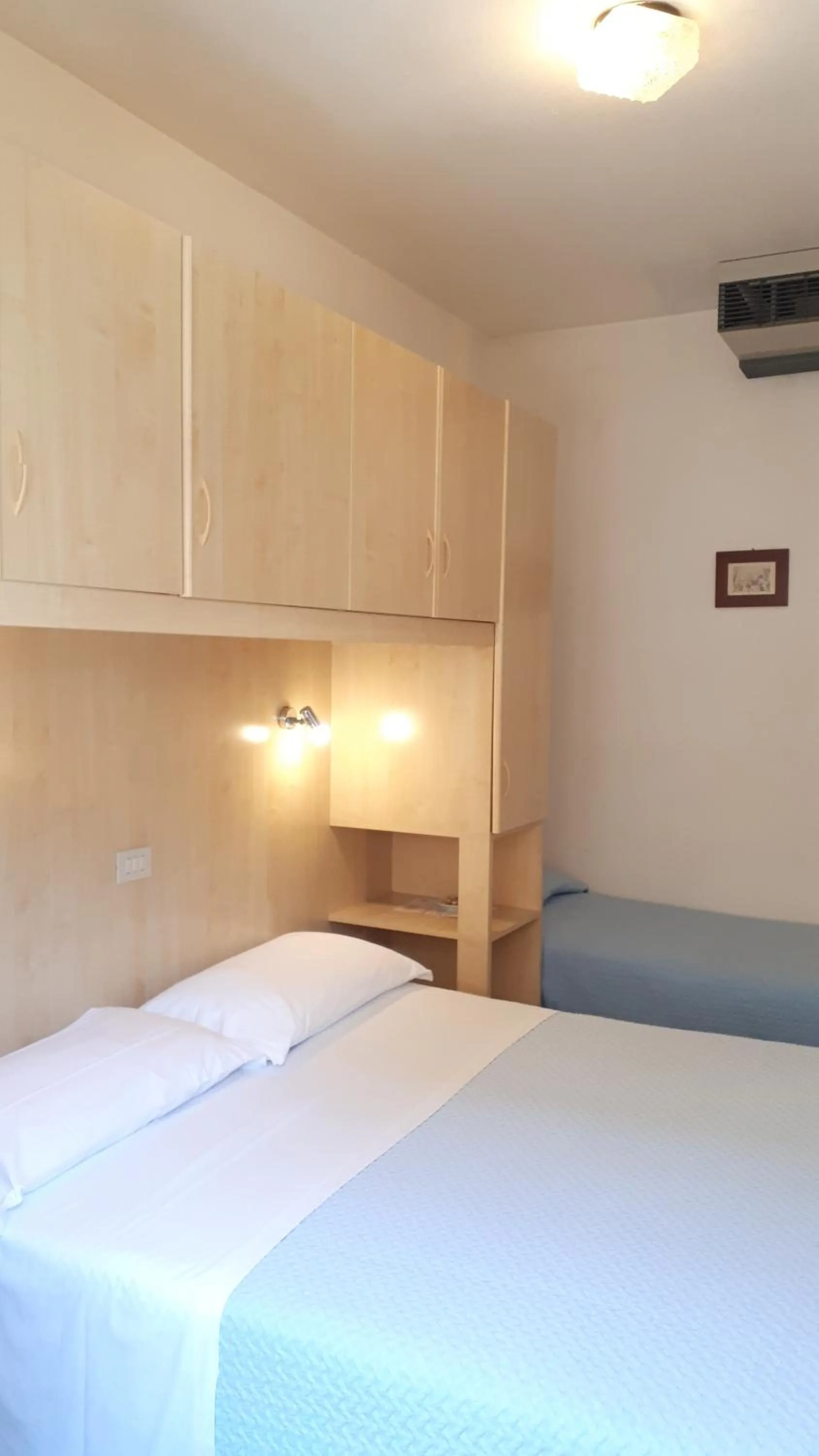 Bed in Hotel Villa Dina