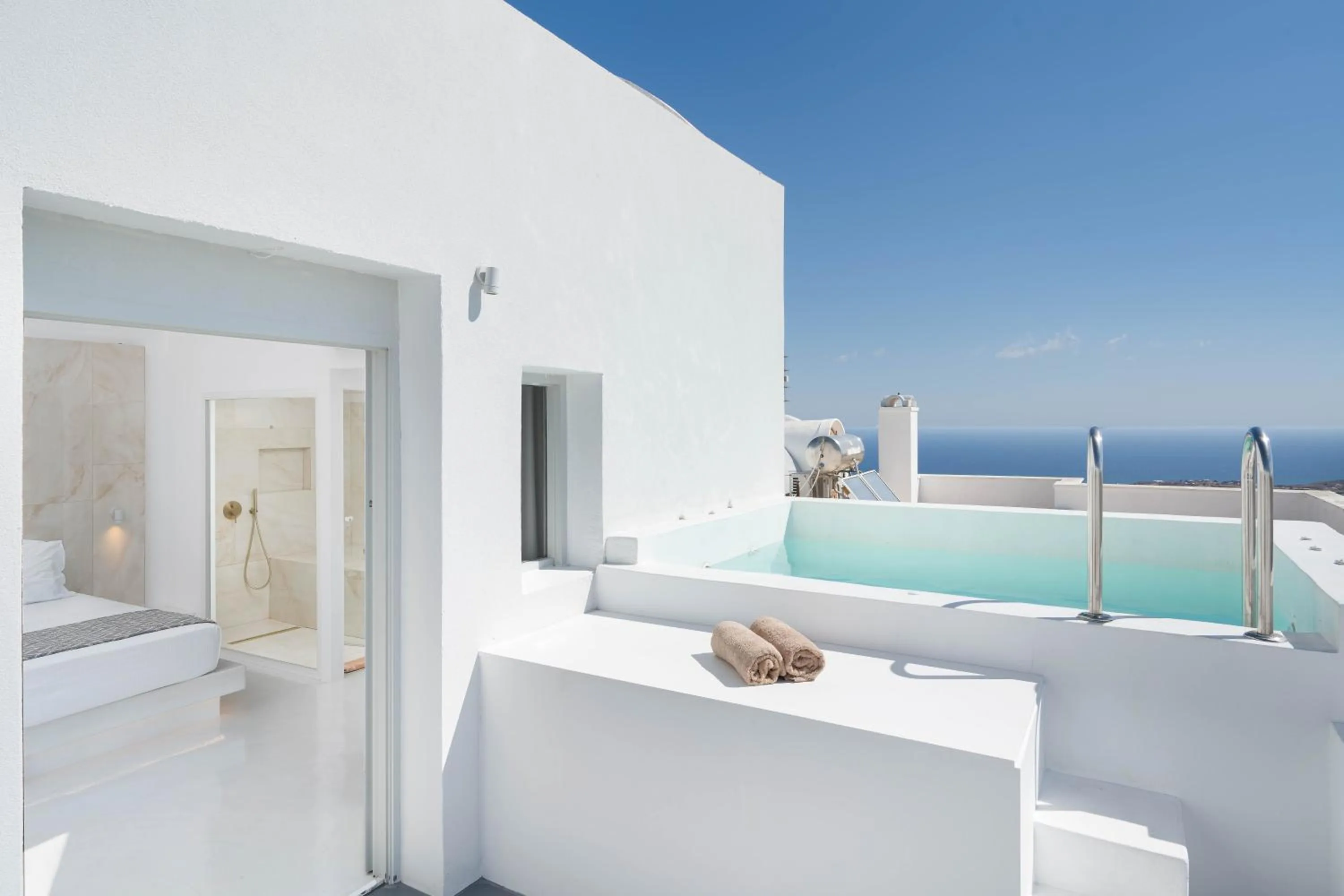 Swimming pool in Cycladic Suites & Spa