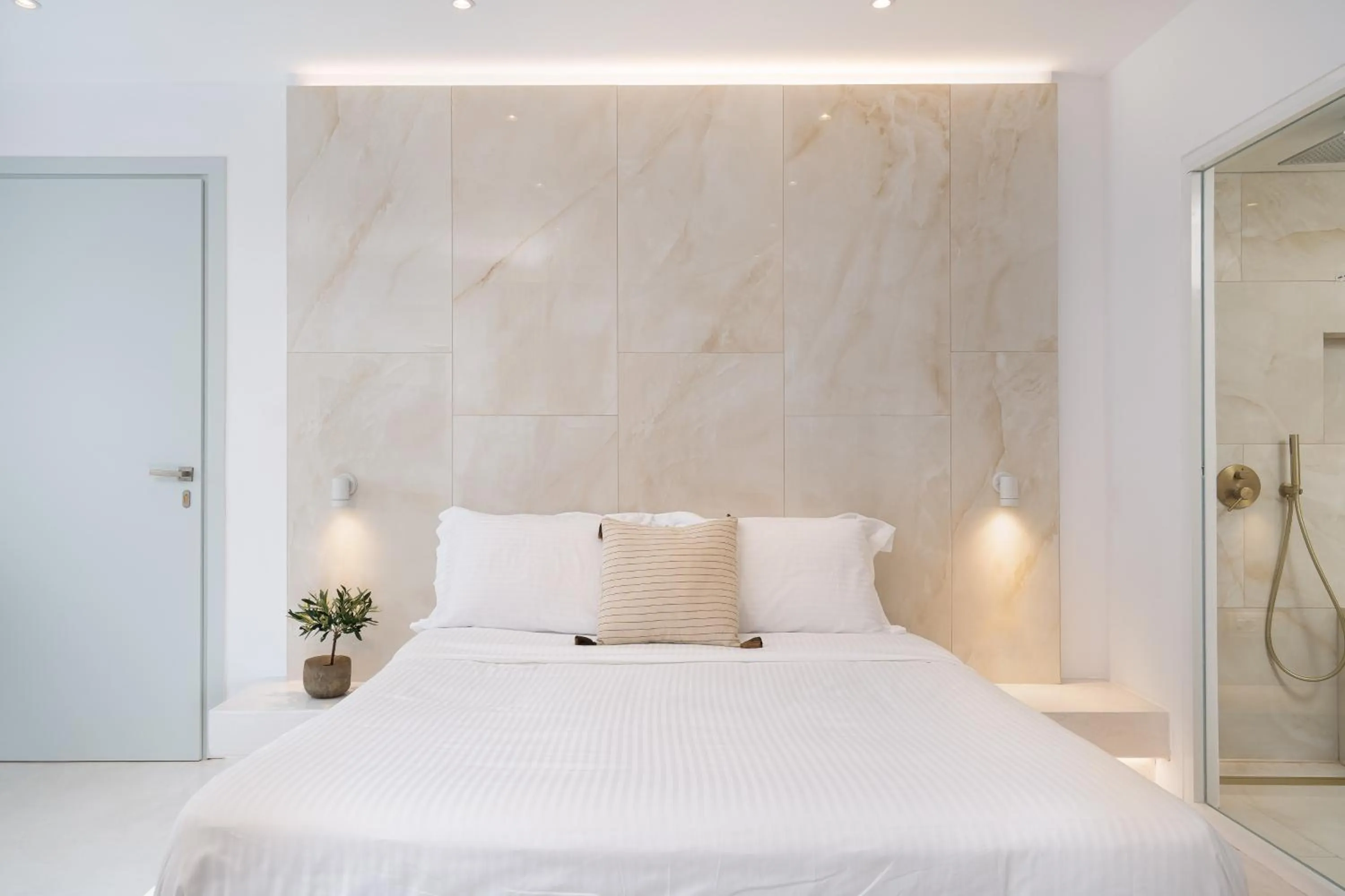 Bed in Cycladic Suites & Spa