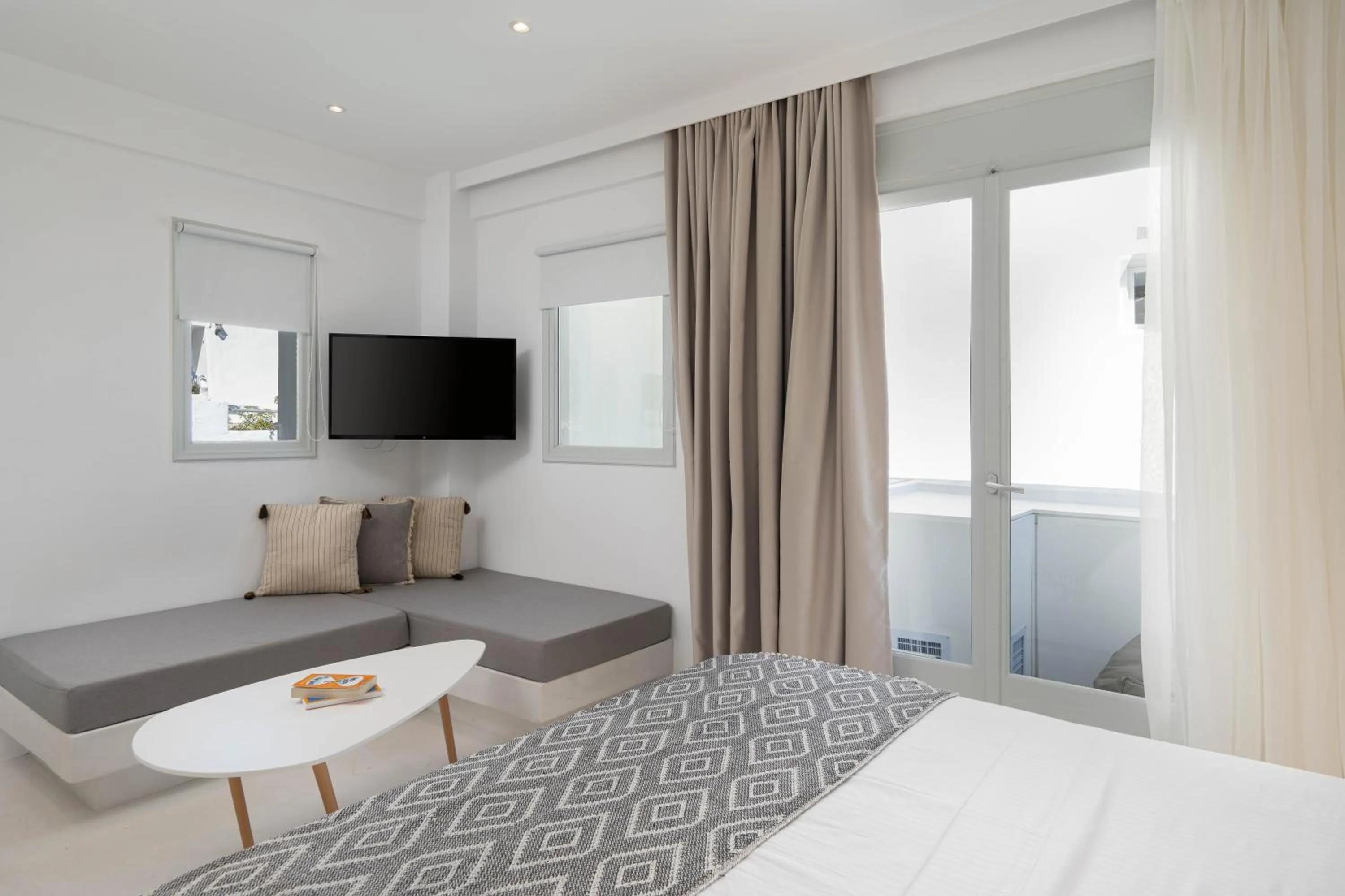 Bed in Cycladic Suites & Spa