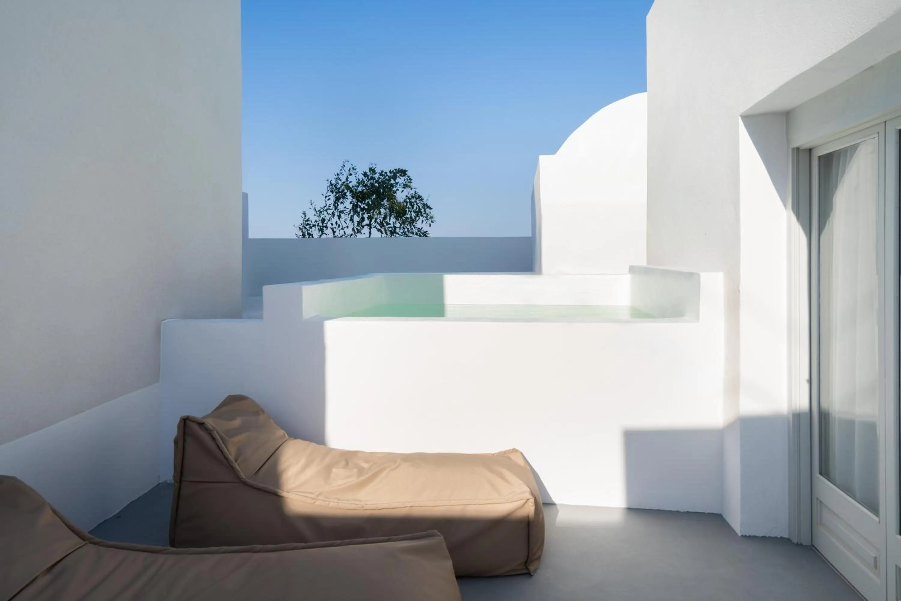 Swimming pool in Cycladic Suites & Spa
