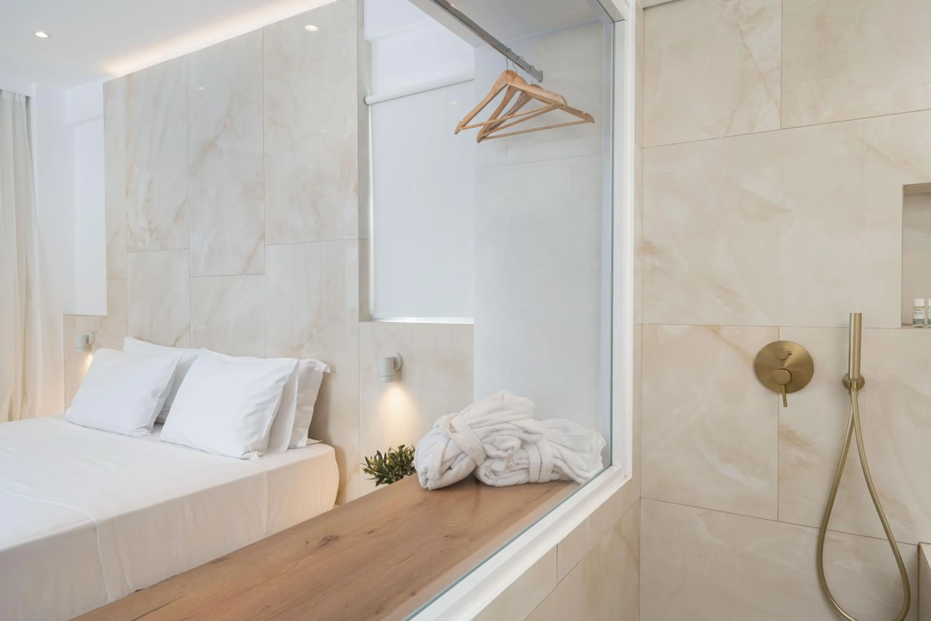 Bed in Cycladic Suites & Spa