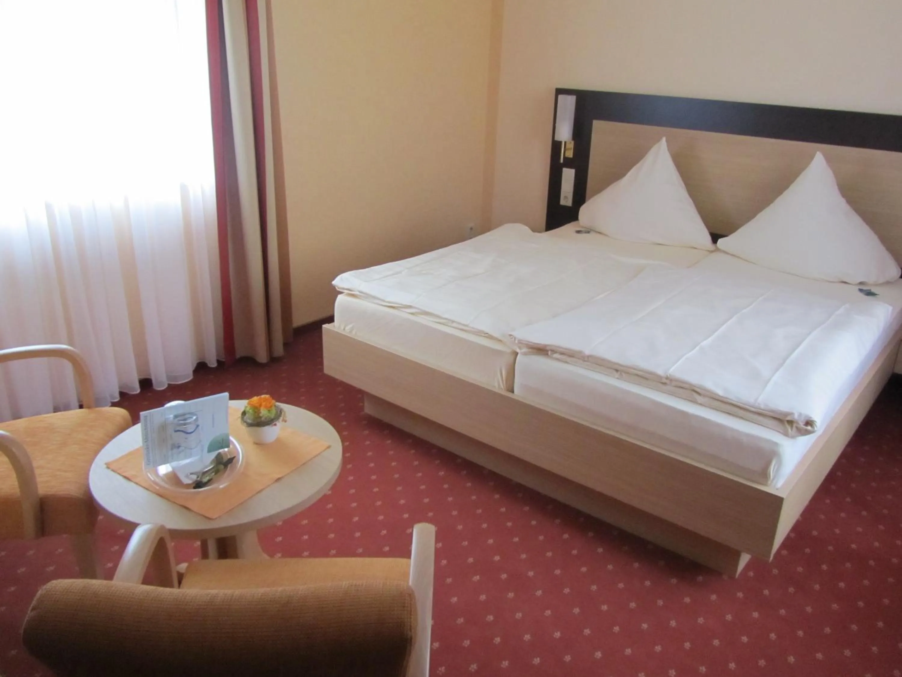 Photo of the whole room, Bed in Weinhaus Berg