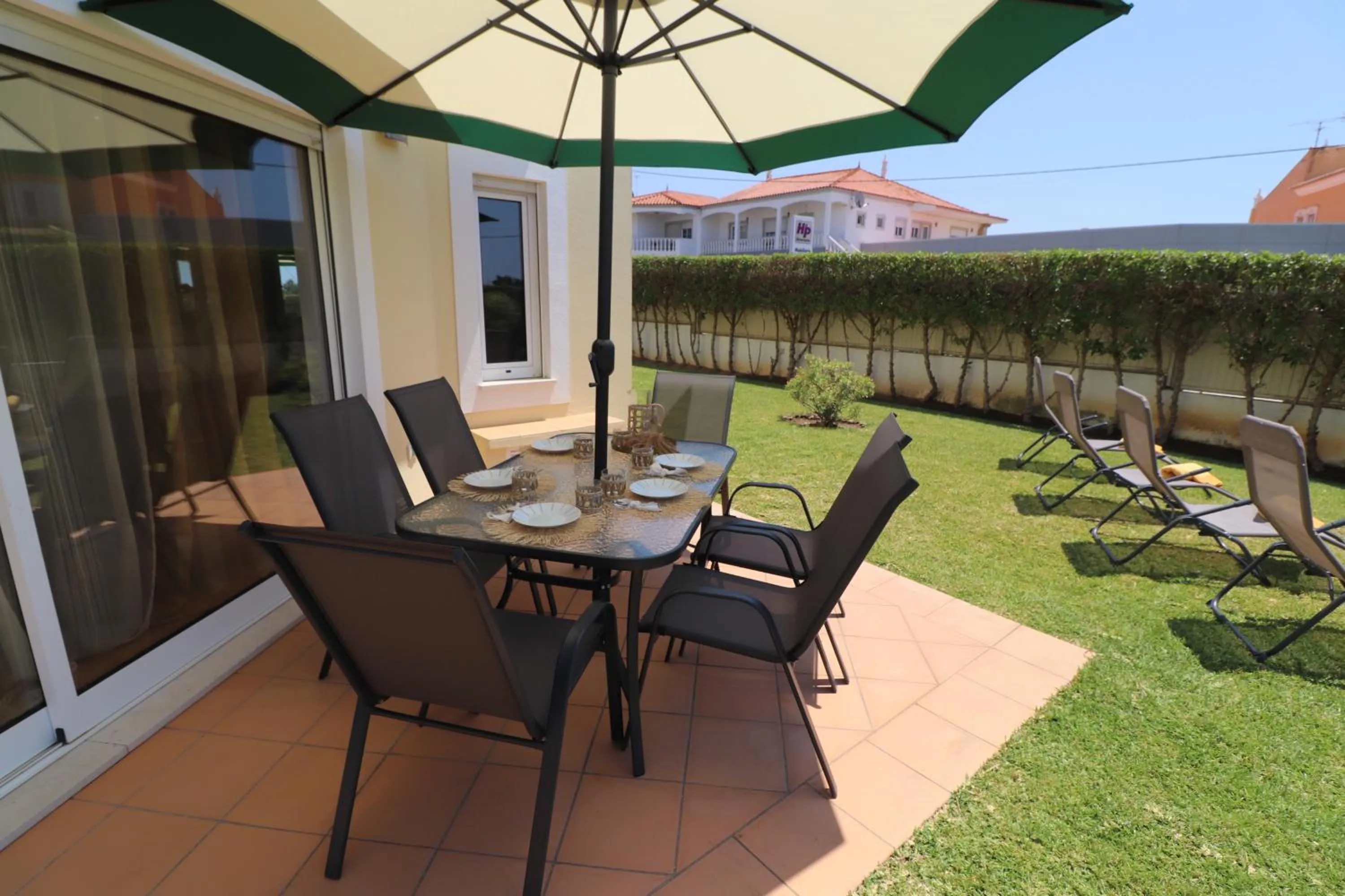 Patio in 3-Bed Townhouse with pool in Albufeira Balaia