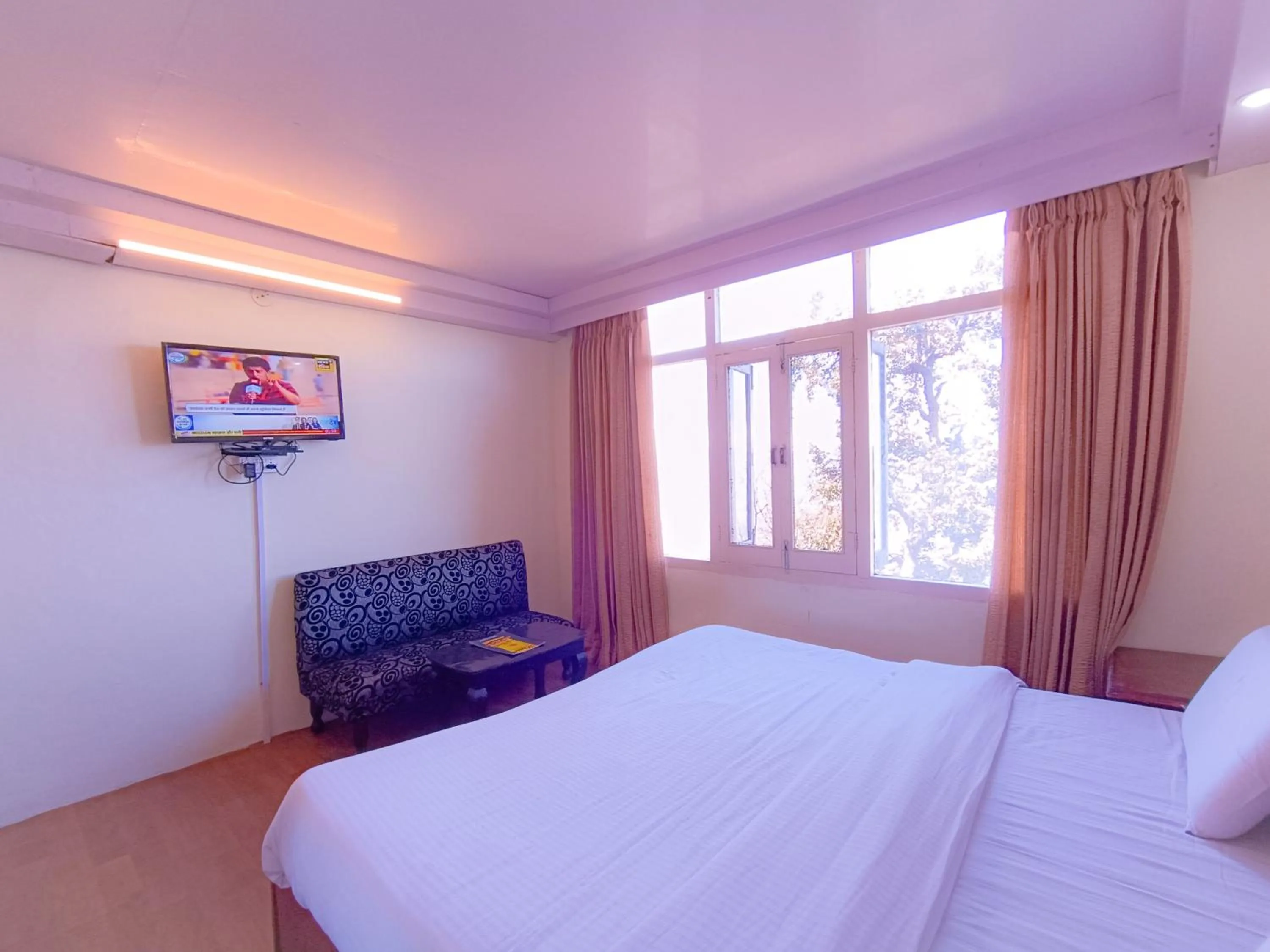 Bed in Surya Resort Dalhousie