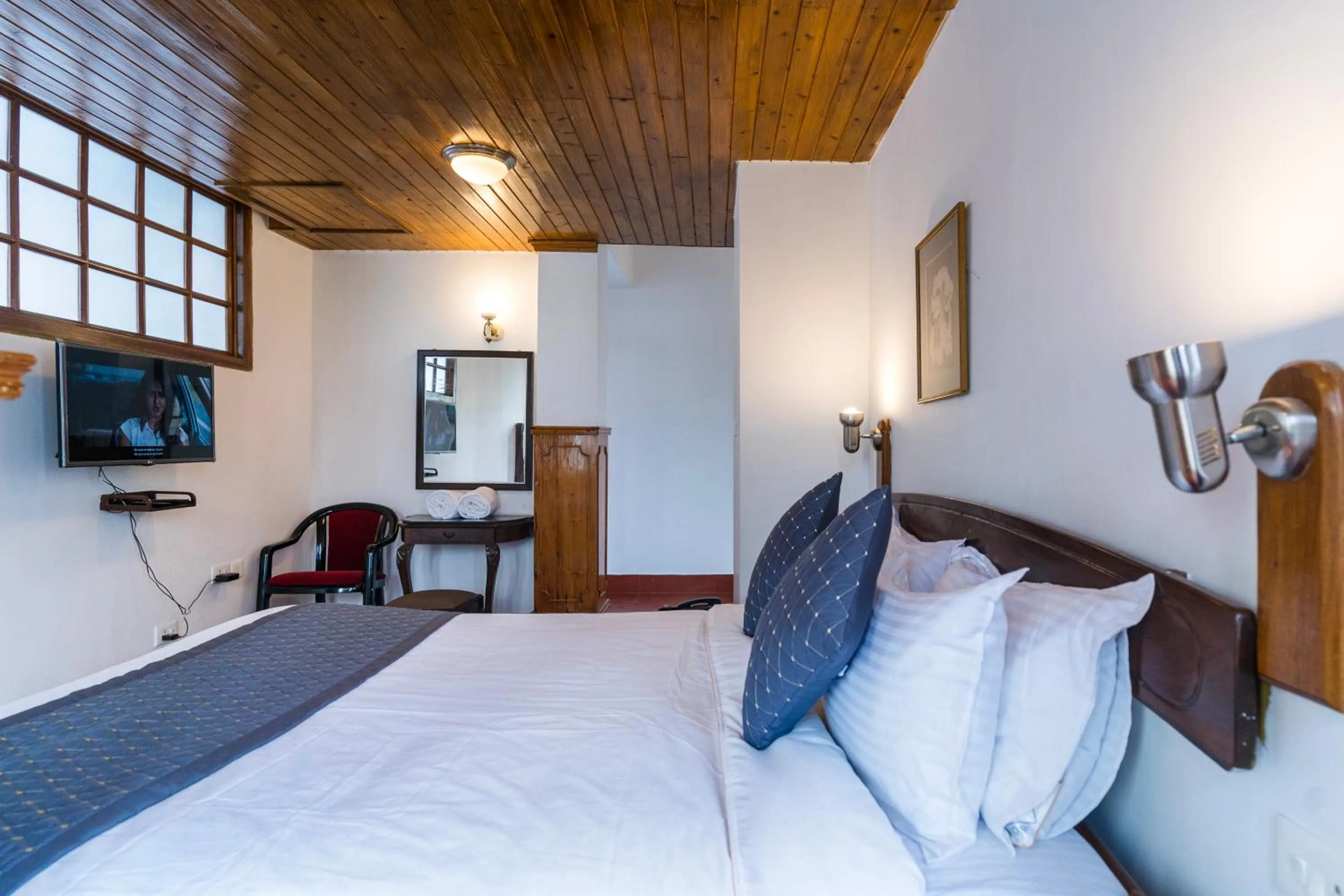 Bed in Sharolyn Boutique Hotel