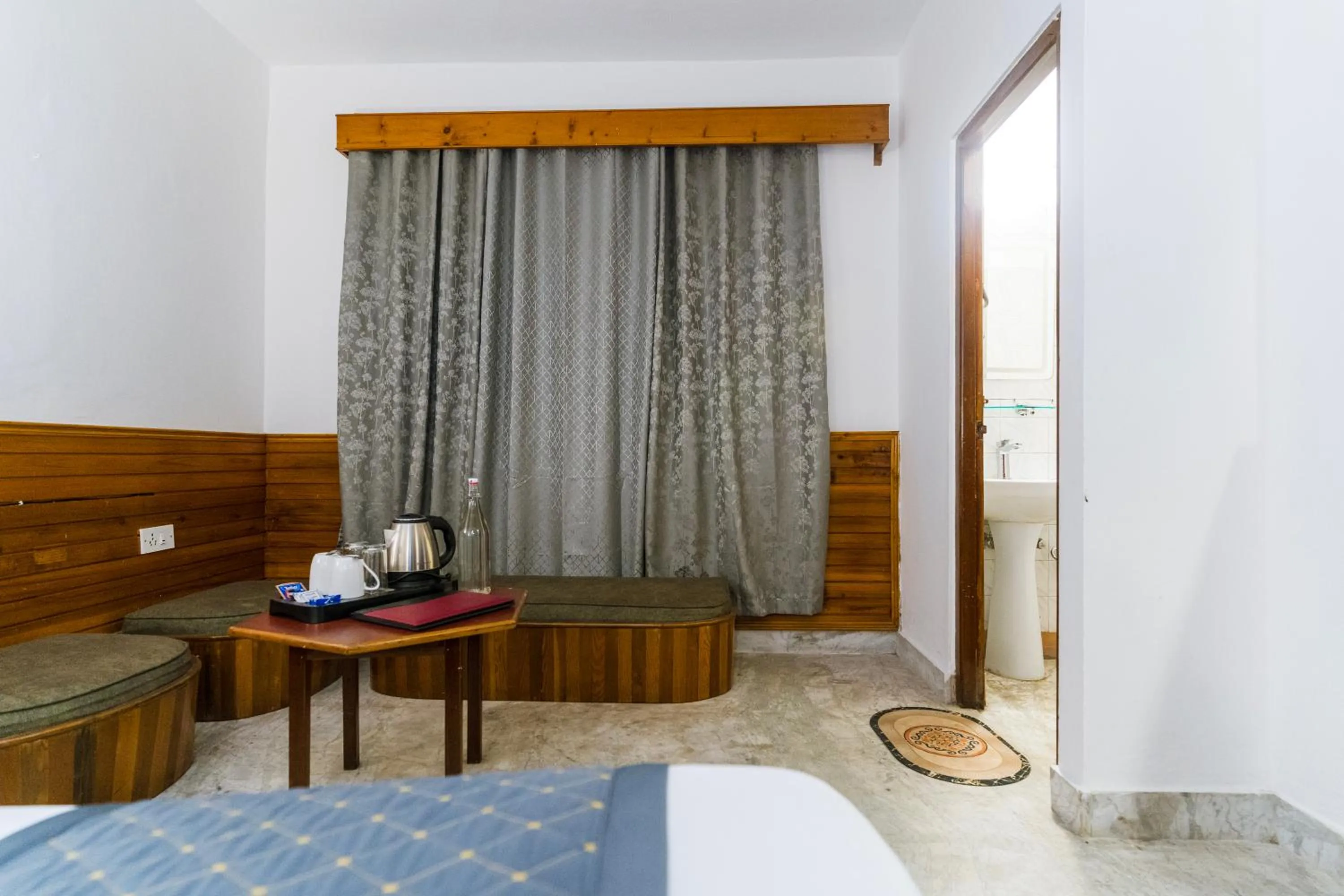 Seating area, Bed in Sharolyn Boutique Hotel