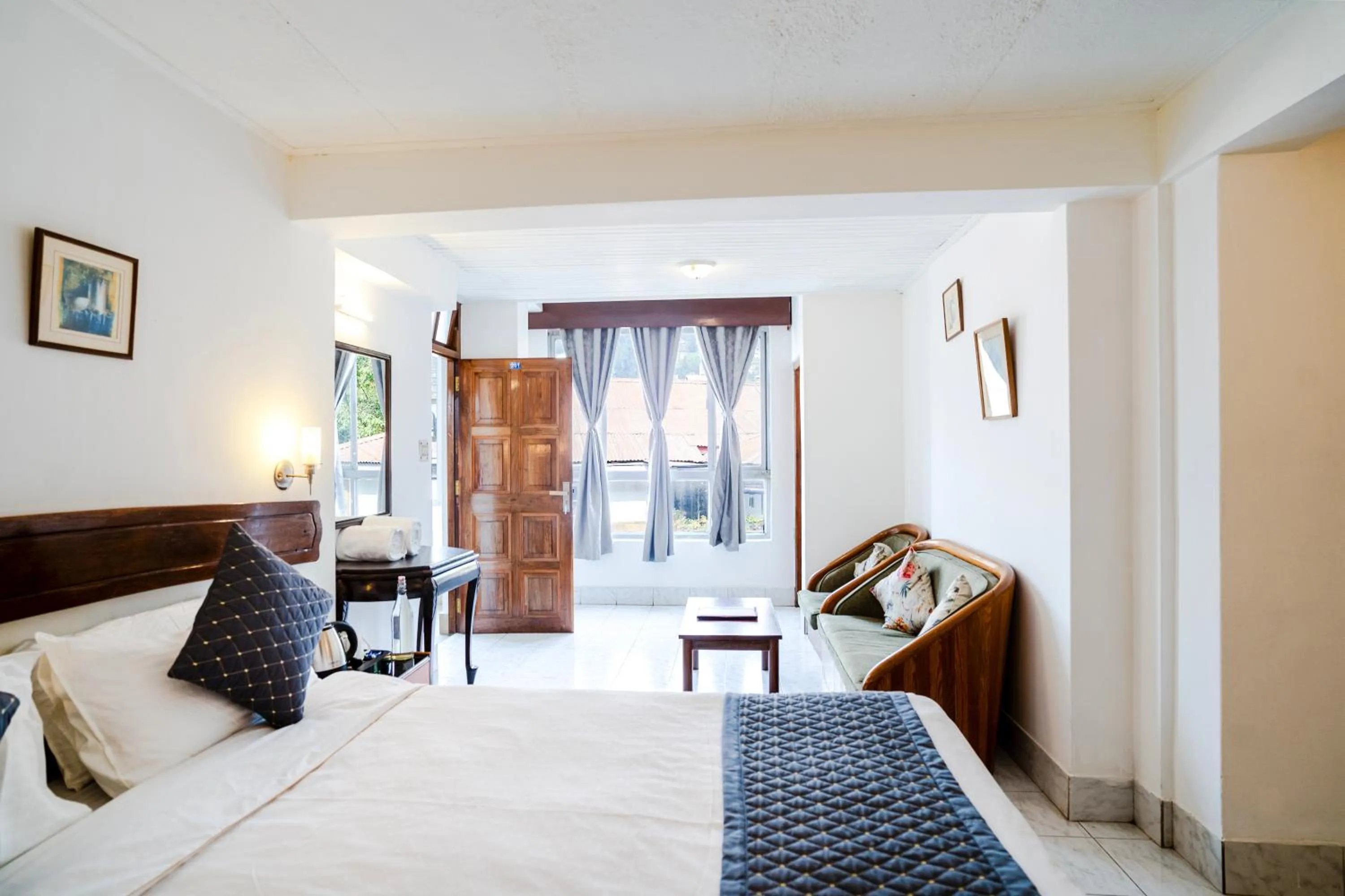 Bed in Sharolyn Boutique Hotel