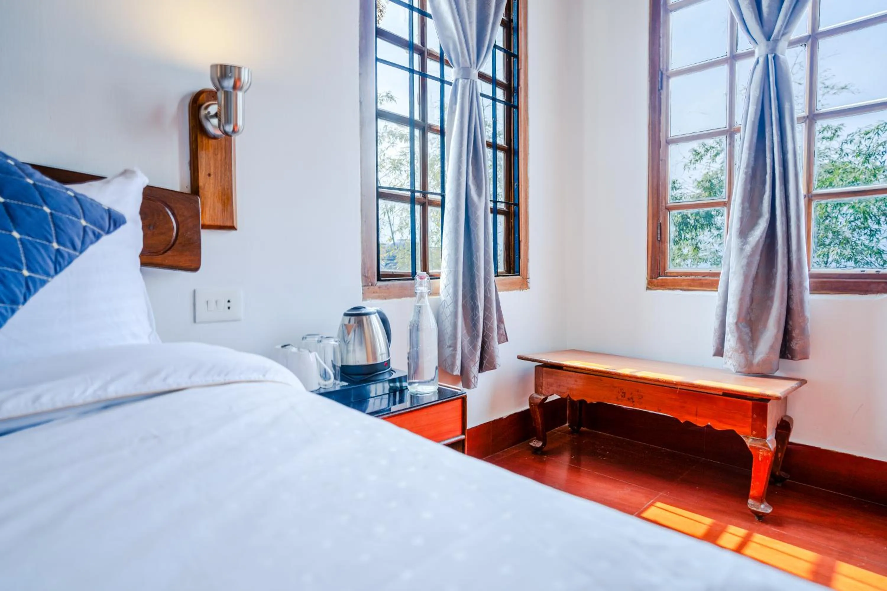 Bed in Sharolyn Boutique Hotel