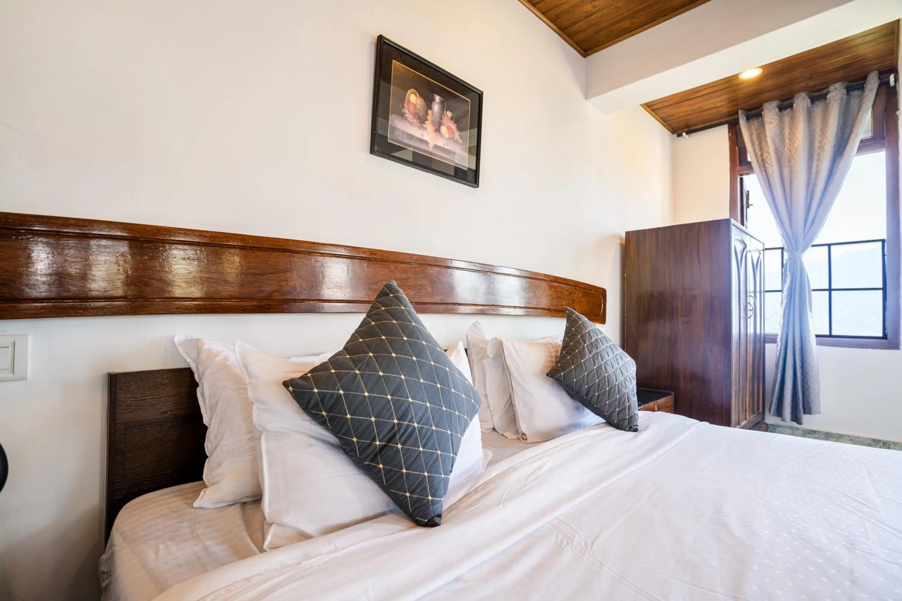 Bed in Sharolyn Boutique Hotel