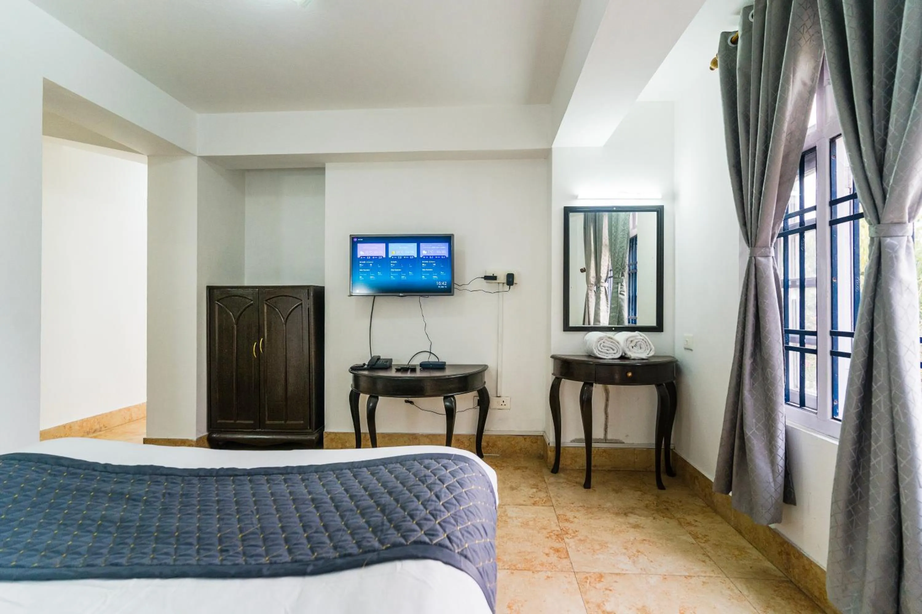 Bed in Sharolyn Boutique Hotel