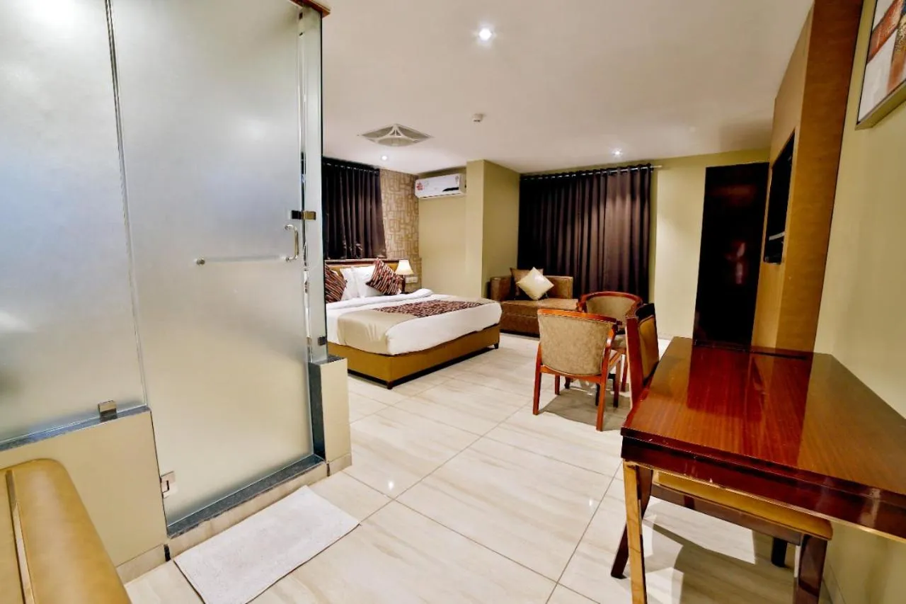 Bedroom in Hotel Kings Heritage Surat