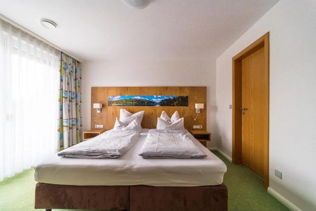 Bed in Gästehaus Café Heck Titisee