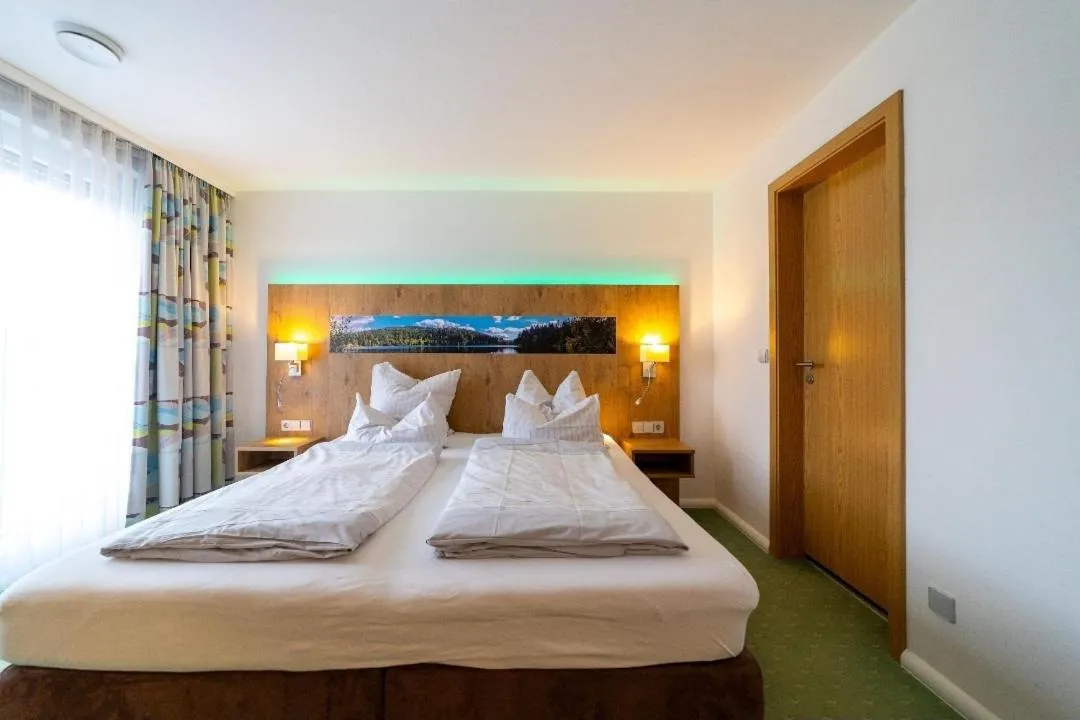 Bed in Gästehaus Café Heck Titisee